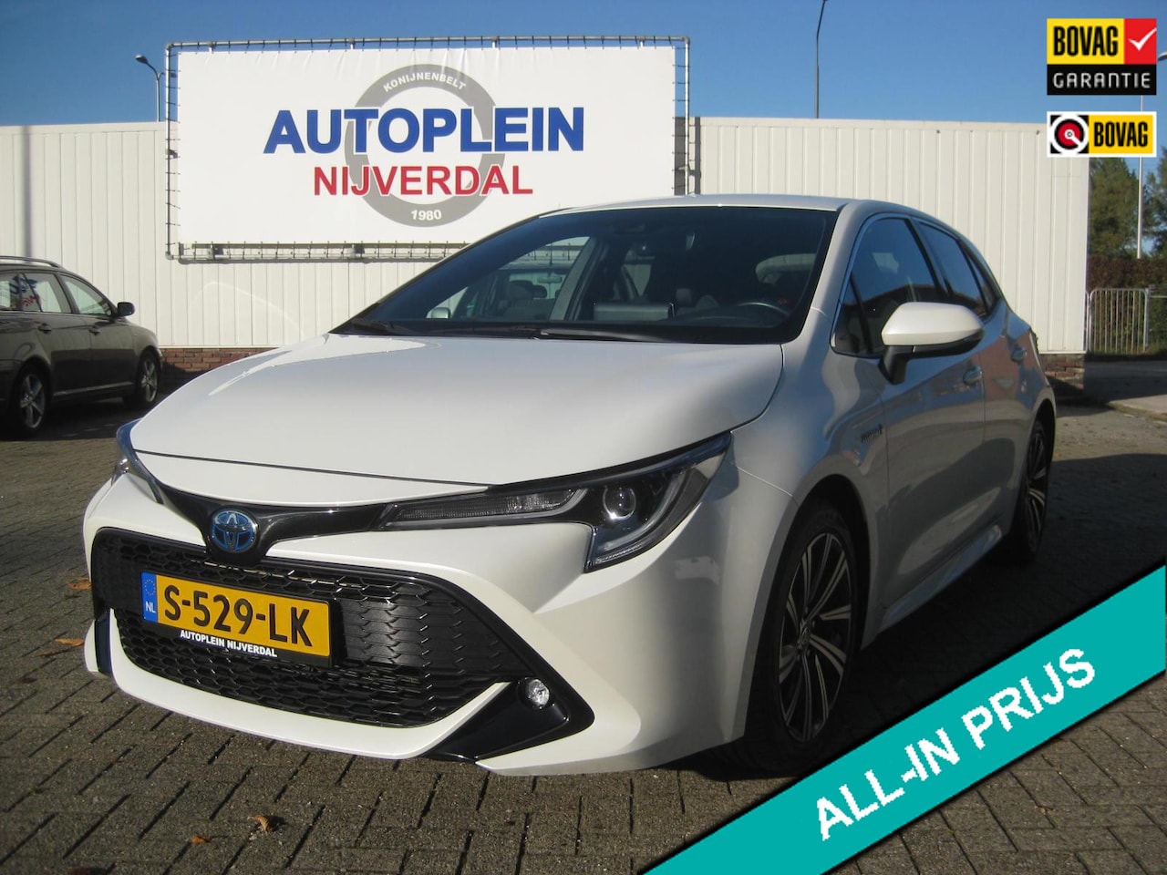 Toyota Corolla - 1.8 Hybrid Dynamic keurig nette maar ook complete corolla in de parelmoer witte lak! - AutoWereld.nl