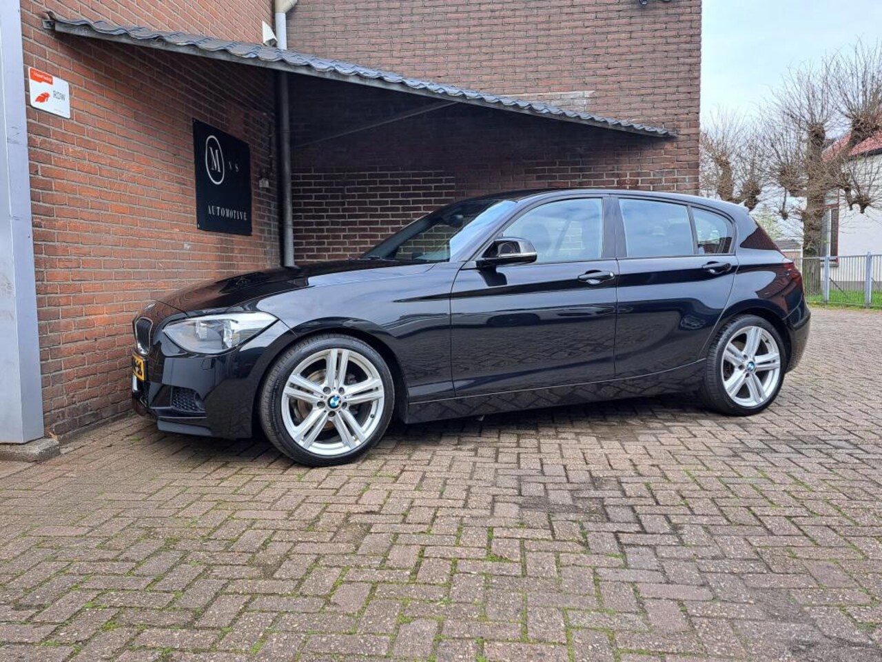 BMW 1-serie - 116i High Executive M-Sport Pakket / Car Play / Cruise Controle / Bluetooth / Stoelverwarm - AutoWereld.nl