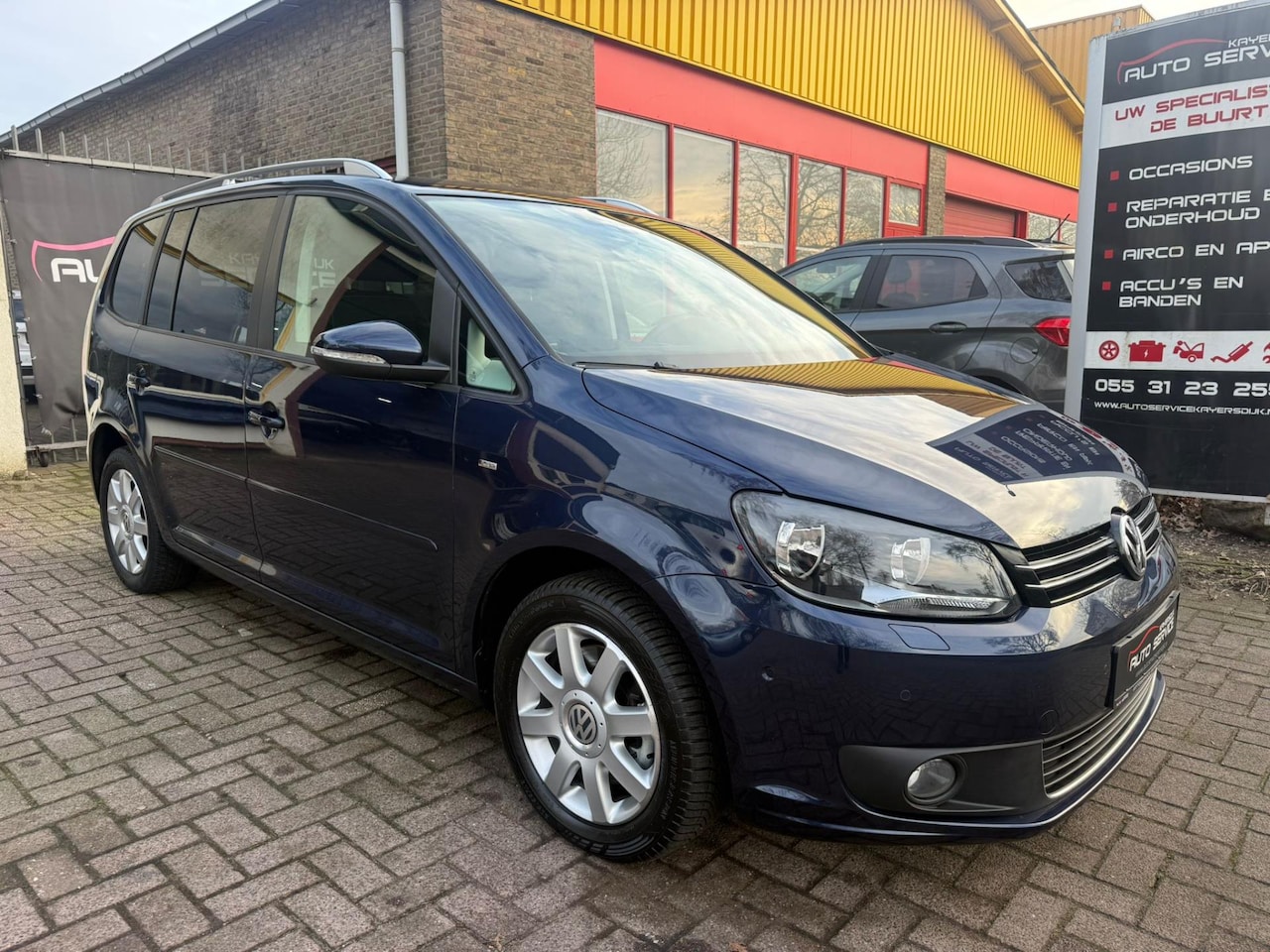 Volkswagen Touran - 1.4 TSI Comfortline EcoFuel 7p. Airco|LMV|Park Pilot|Cruise C.|Apk|Airco - AutoWereld.nl