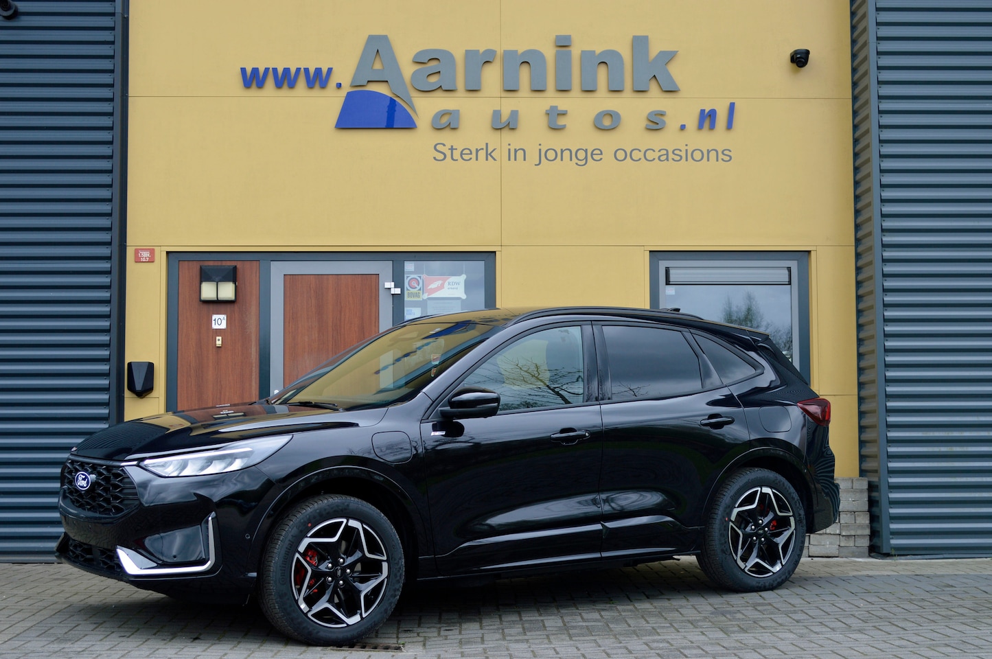 Ford Kuga - 2.5 PHEV ST-Line X camera, winterpack, trekhaak, agr stoelen incl mem, lederen bekl, B&O s - AutoWereld.nl