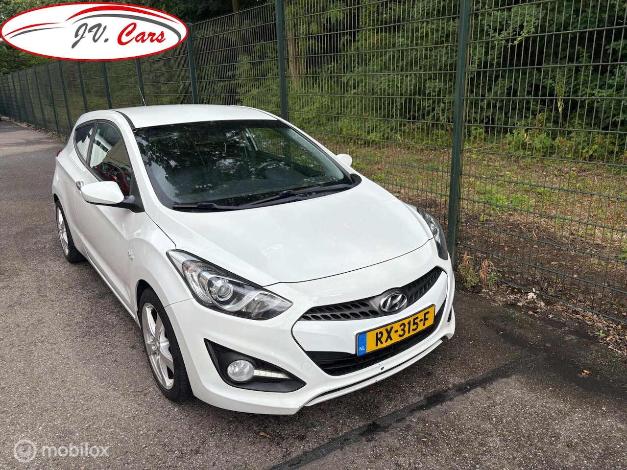 Hyundai i30 - 1.4 Coupe - AutoWereld.nl