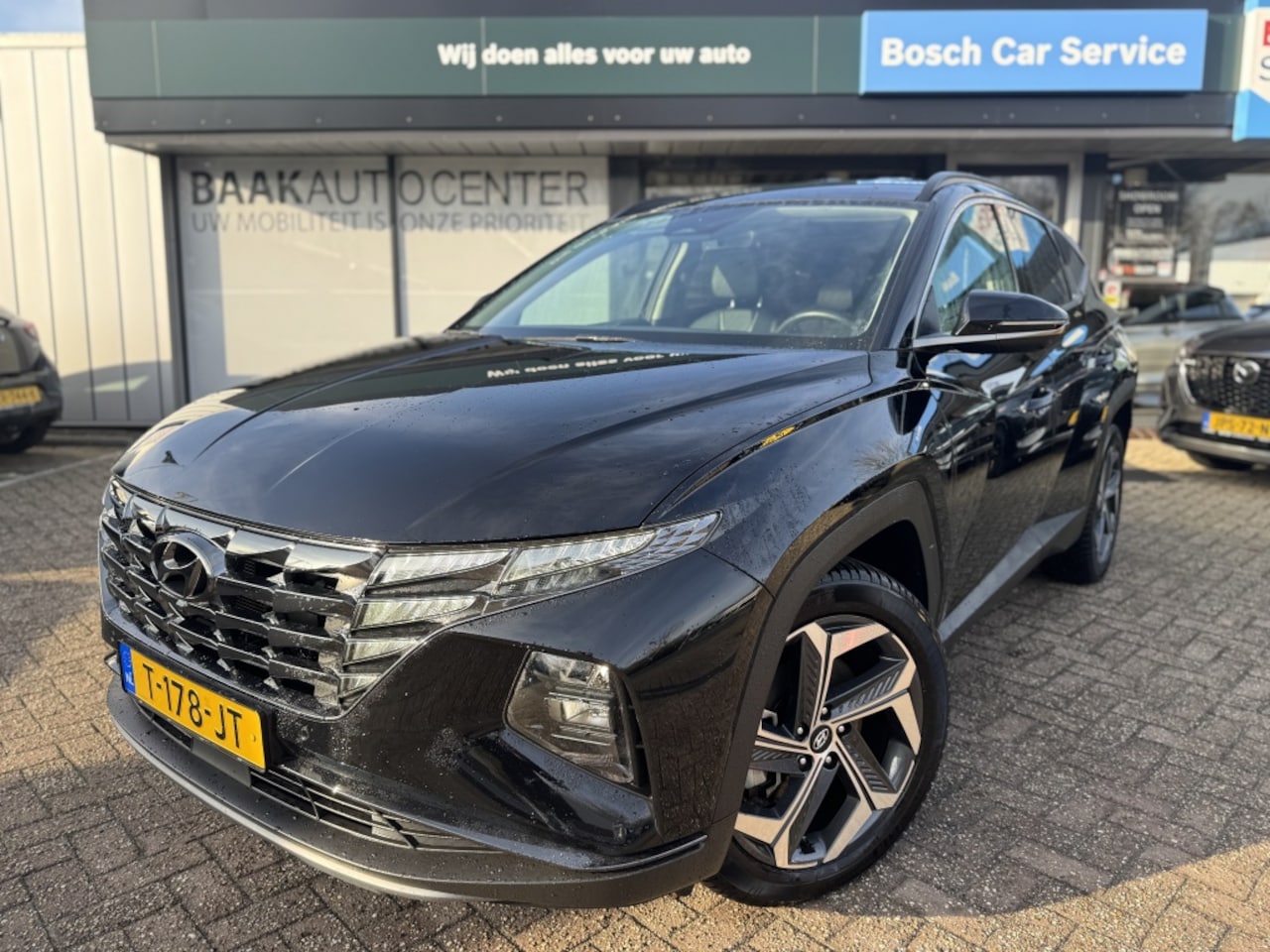 Hyundai Tucson - 1.6 T-GDI HEV Premium | Leer | Navigatie - AutoWereld.nl