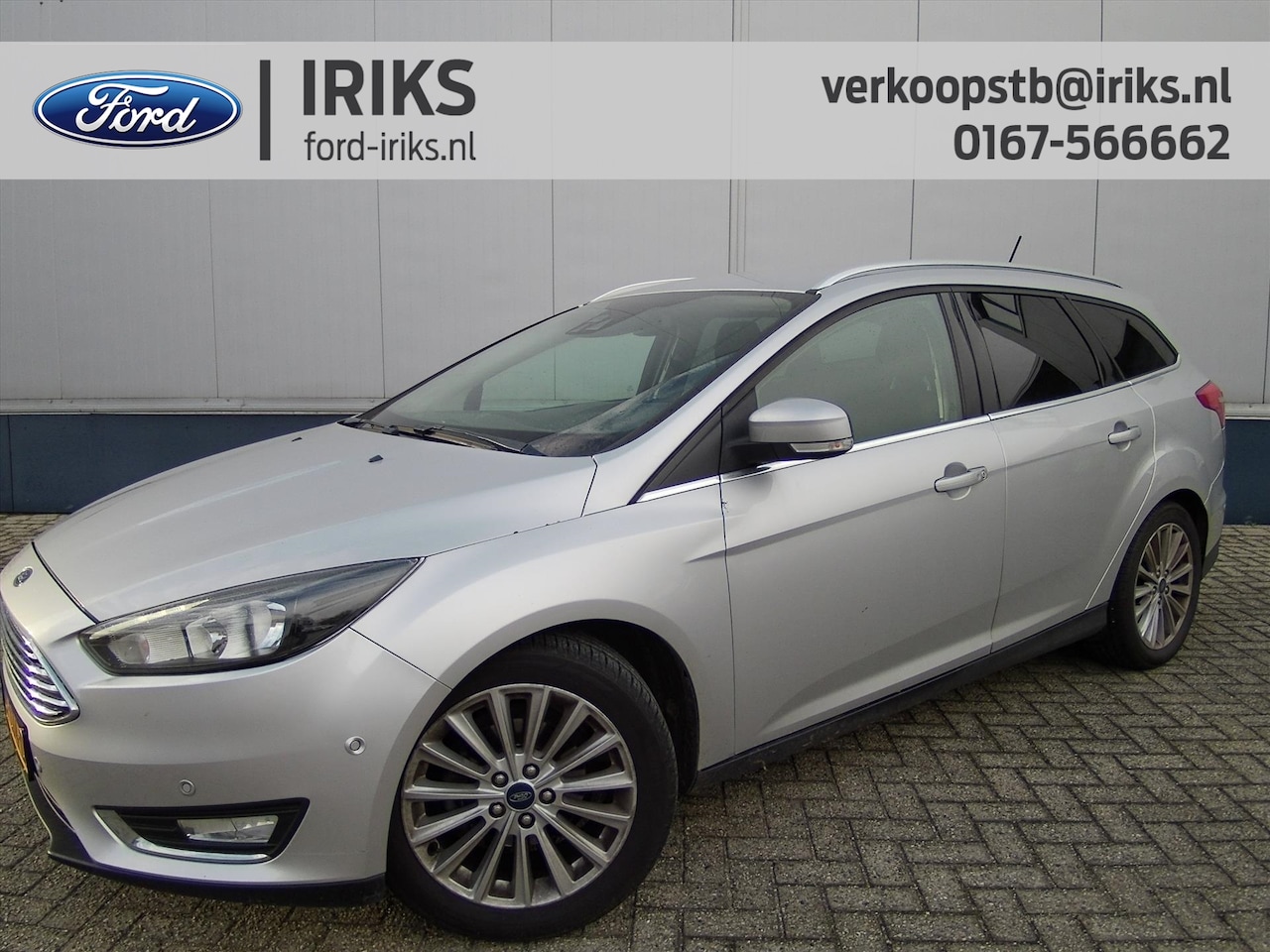 Ford Focus Wagon - 1.0 EcoBoost 125pk Titanium Trekhaak Navigatie 17 Inch - AutoWereld.nl