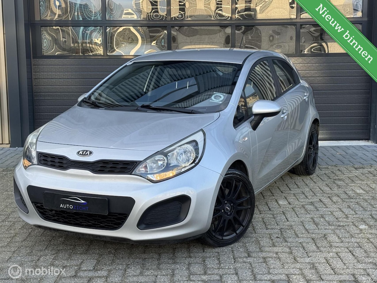 Kia Rio - 1.2 CVVT Comfort Pack 1.2 CVVT Comfort Pack - AutoWereld.nl