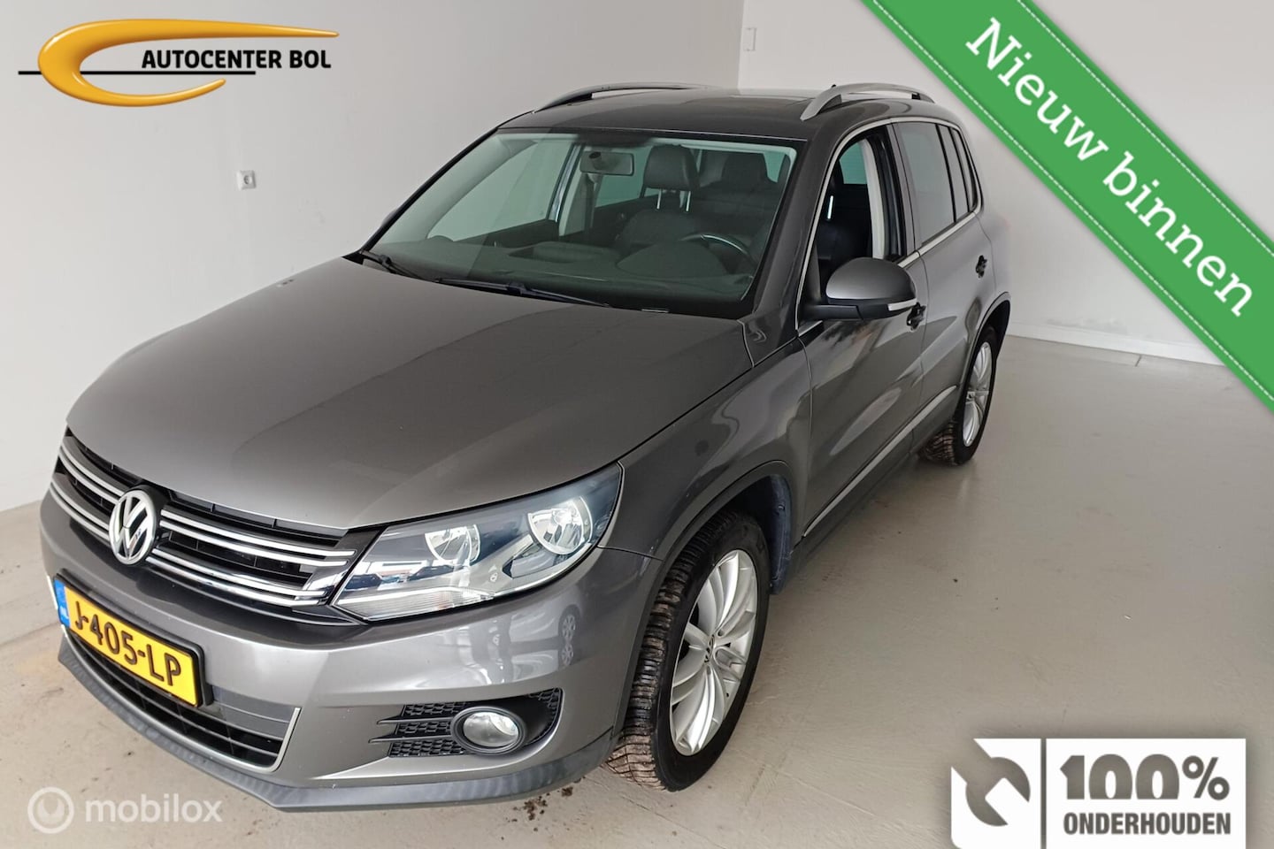 Volkswagen Tiguan - 2.0 TSI Sport&Style Trekhaak - AutoWereld.nl