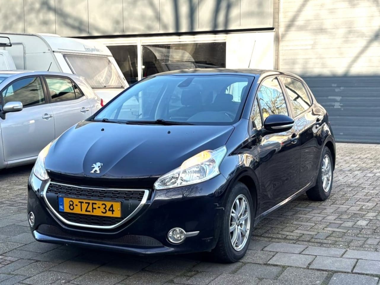 Peugeot 208 - 1.2 VTi Envy APK NAP AIRCO - AutoWereld.nl
