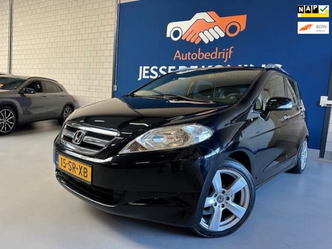 Honda FR-V - 1.7i Comfort / bj.2006 / climate / trekhaak / 1e eigenaar /6 persoons / airco / NAP met 19 - AutoWereld.nl