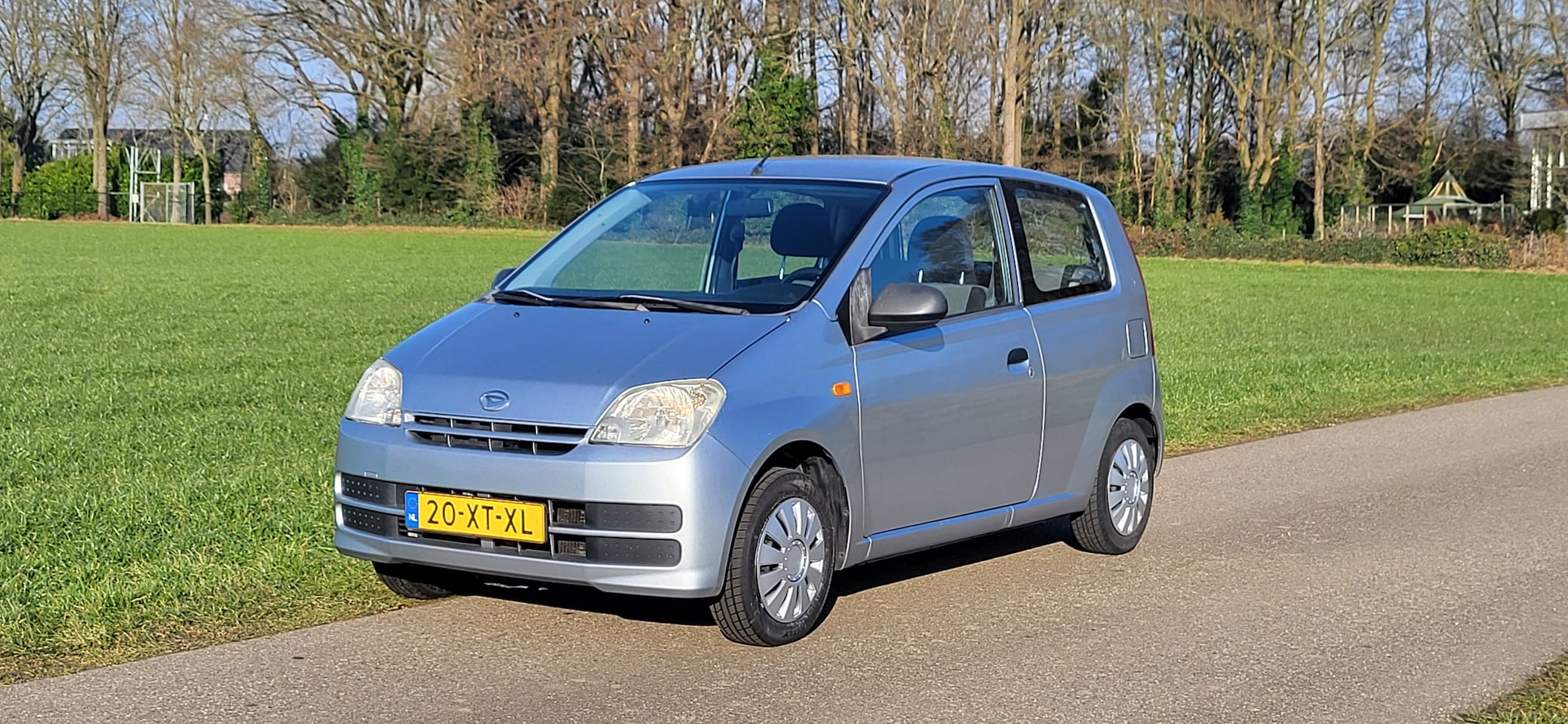 Daihatsu Cuore - 1.0-12V 100th Anniversary - AutoWereld.nl