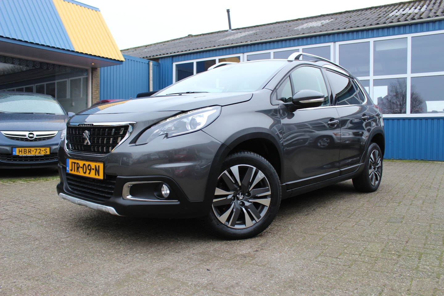 Peugeot 2008 - 1.2i "Allure" Half leder - Cruise - Navi !!! Automaat 110 Pk - AutoWereld.nl