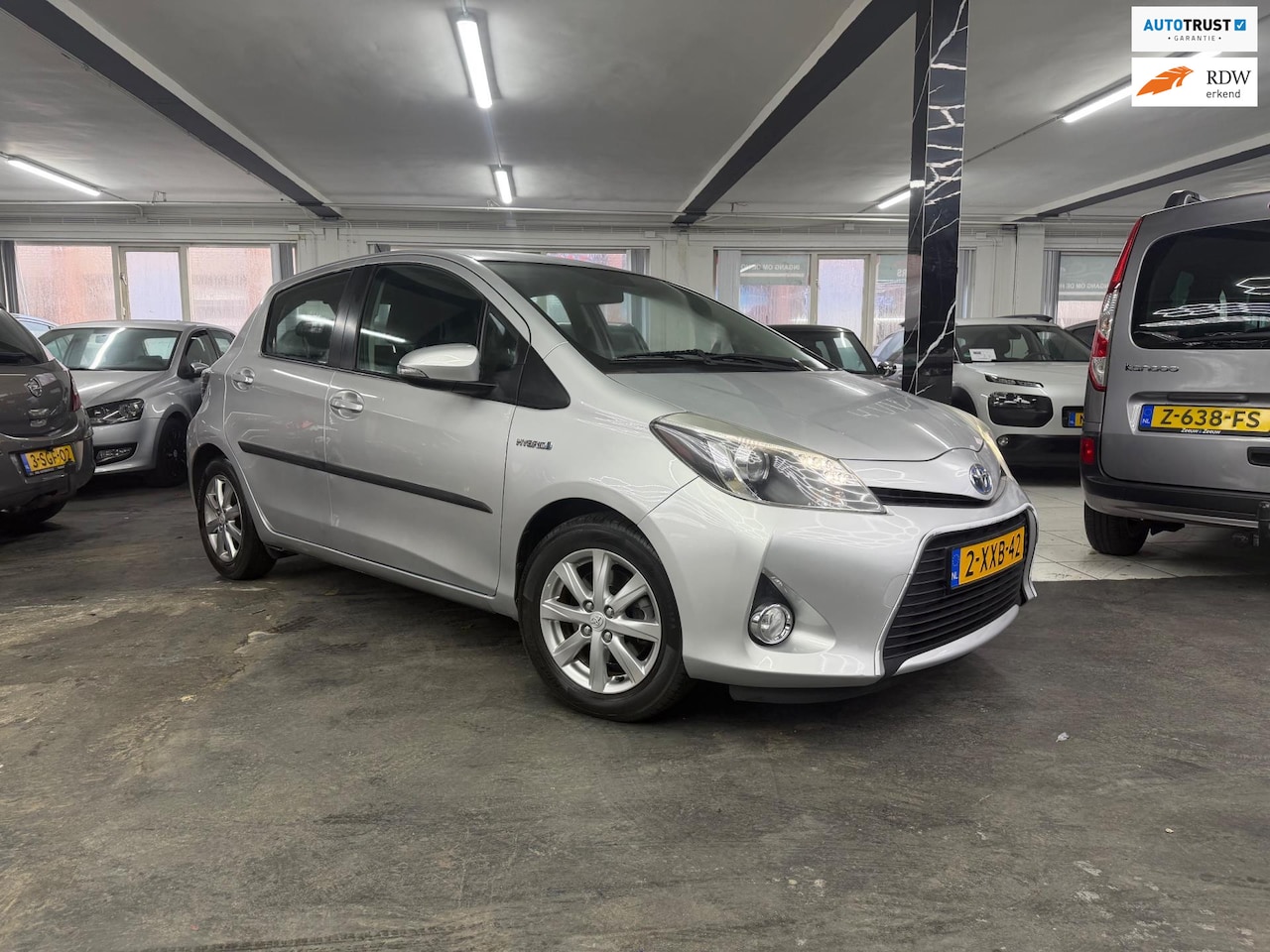 Toyota Yaris - 1.5 Full Hybrid Aspiration dealer onderhouden - AutoWereld.nl