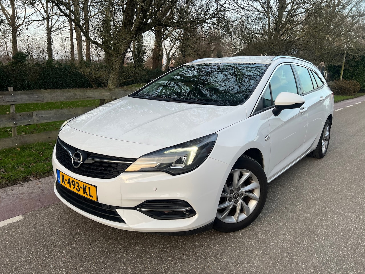 Opel Astra Sports Tourer - 1.2 Business Elegance Camera, Navi - AutoWereld.nl