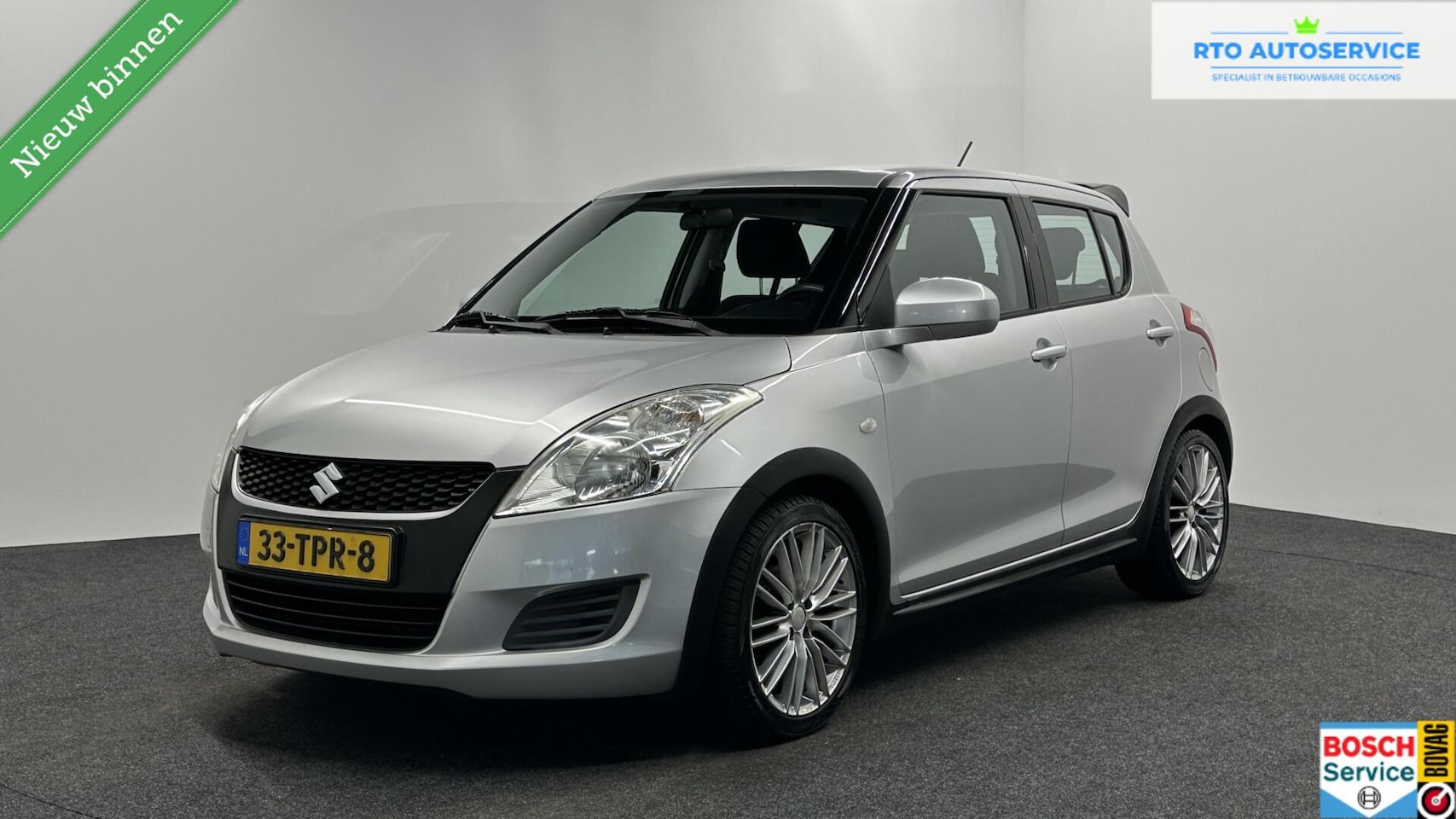 Suzuki Swift - 1.2 Comfort EASSS AIRCO 5 DEURS TREKHAAK. - AutoWereld.nl