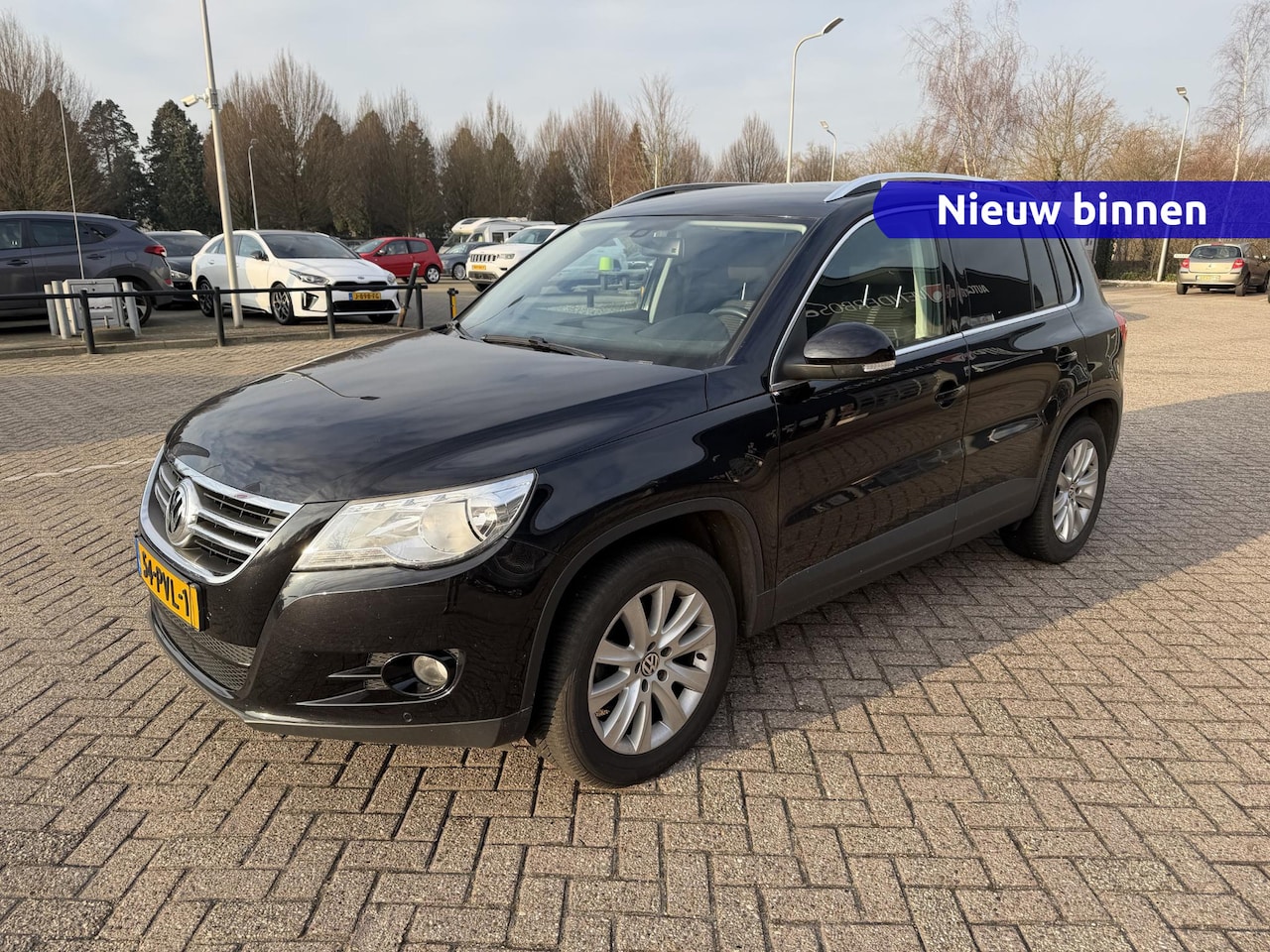 Volkswagen Tiguan - 1.4 TSI Sport&Style 150pk | Trekhaak | PDC | Navigatie - AutoWereld.nl