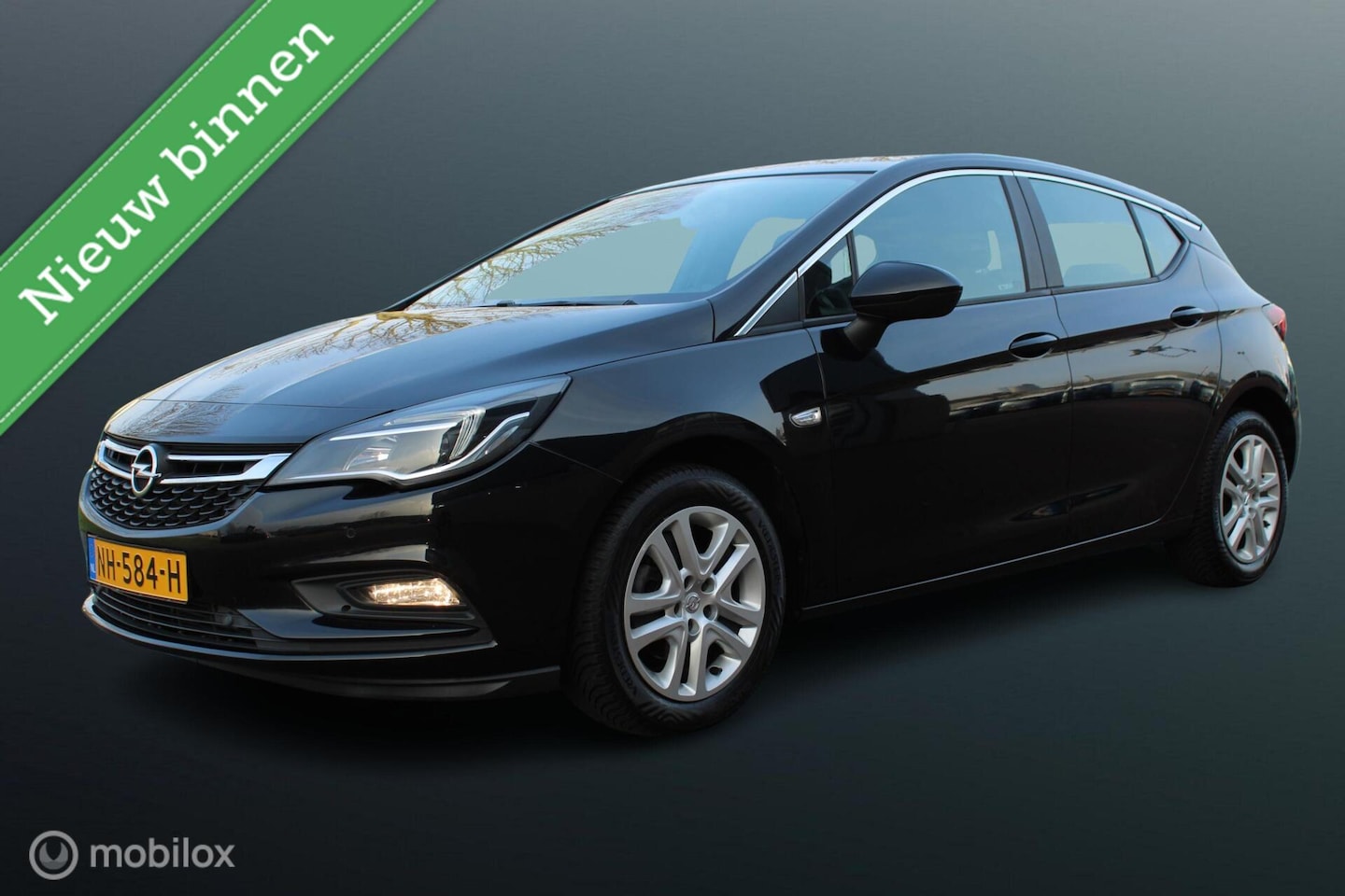 Opel Astra - 1.0 Online Edition 1.0 Online Edition, Stoel stuur verw, Pdc voor + achter, Navi, Cruise, 16 inch LMV. - AutoWereld.nl