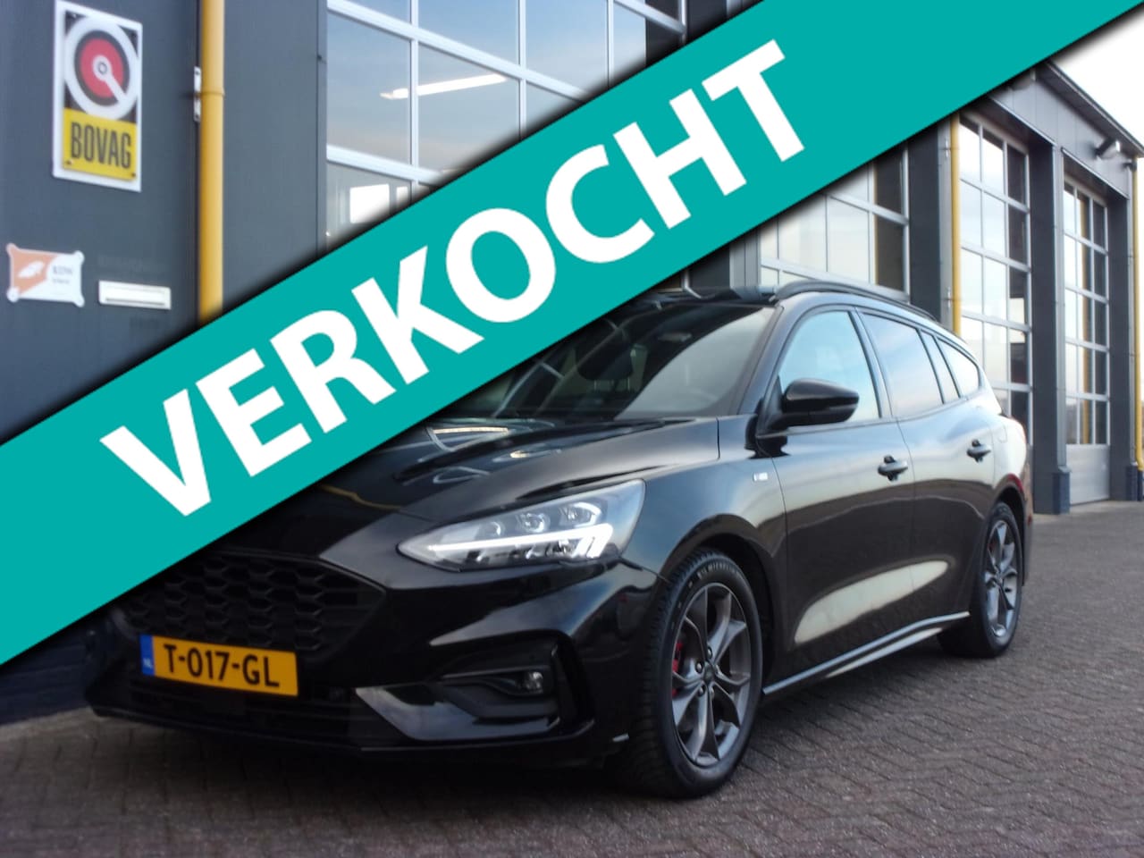 Ford Focus Wagon - 1.0/125pk Hybrid ST-Line NAV CAM TH ECC HUD RR Keyless Privacy Glass - AutoWereld.nl