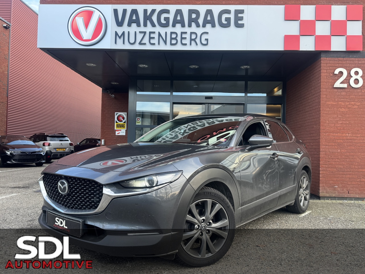 Mazda CX-30 - 2.0 e-SkyActiv-X M Hybrid Luxury // NAVI // LEDER // TREKHAAK // CAMERA // MEMORY SEATS // - AutoWereld.nl