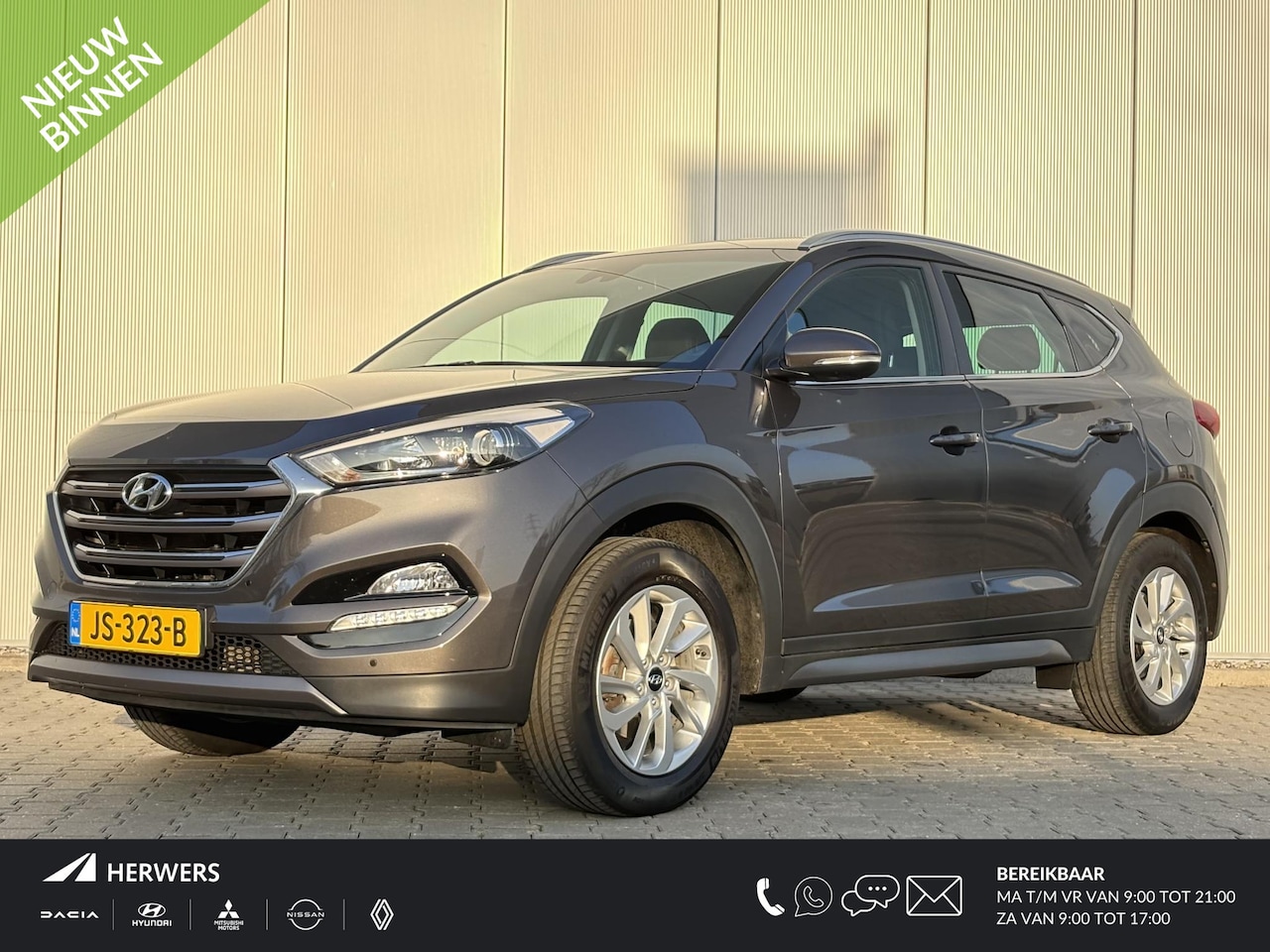 Hyundai Tucson - 1.6 GDi Comfort / Navigatie /Airco Automatisch / Cruise Control / Stoelverwarming Voor & A - AutoWereld.nl