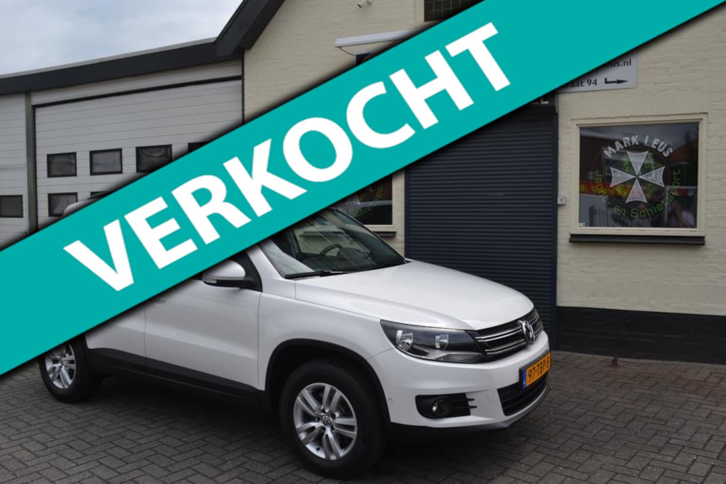 Volkswagen Tiguan - 1.4 TSI Comfort&Design/Pano/Groot Navi/Trekhaak - AutoWereld.nl