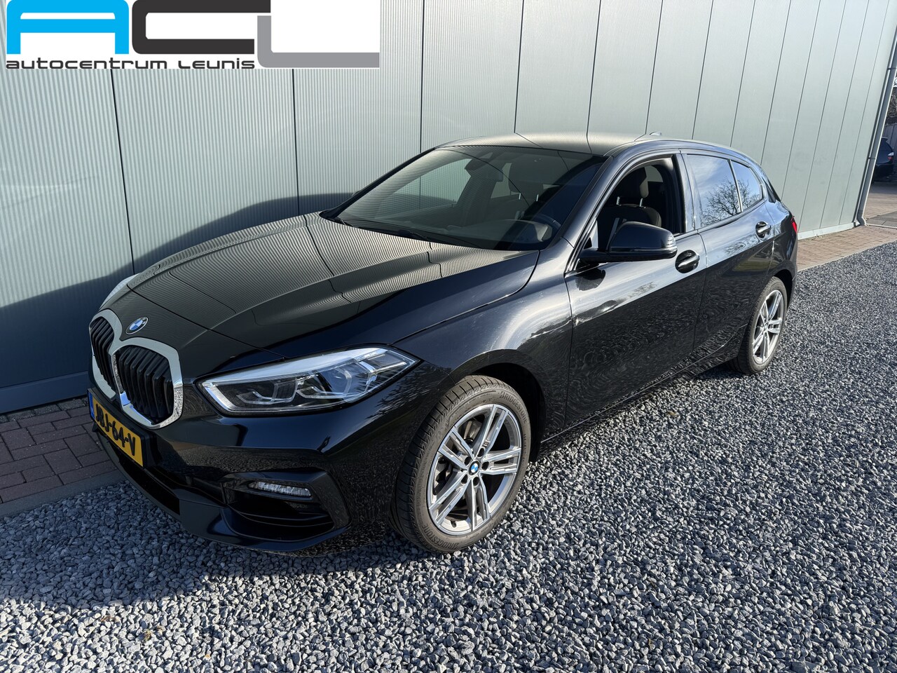 BMW 1-serie - 118i 140pk Automaat High Executive Sportline 5-drs - AutoWereld.nl