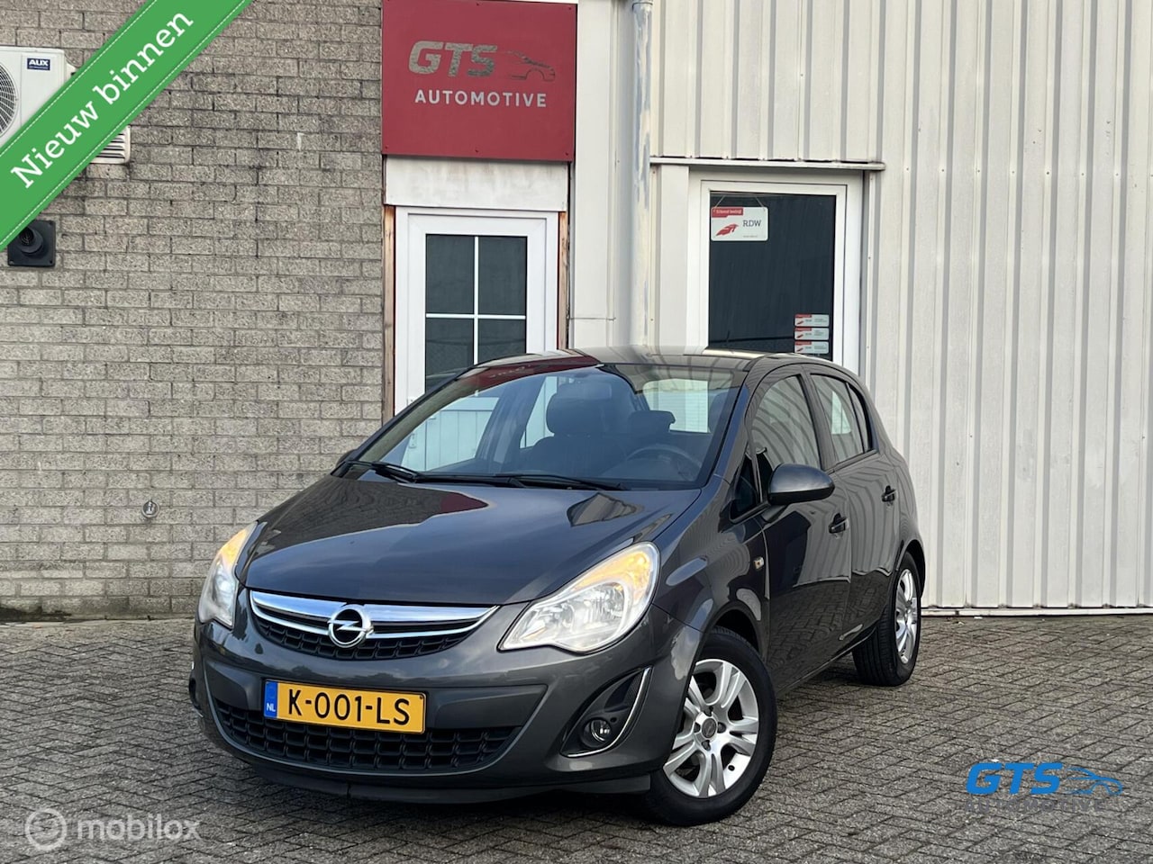 Opel Corsa - 1.2-16V Rhythm 2012 Airco CruiseCnt Nw.APK - AutoWereld.nl