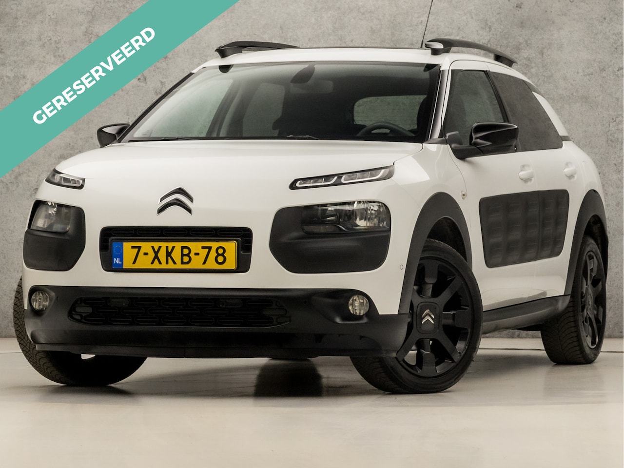 Citroën C4 Cactus - 1.2 e-VTi Shine Automaat (PANORAMADAK, NAVIGATIE, CAMERA, LEDER, STOELVERWARMING, SPORTSTO - AutoWereld.nl