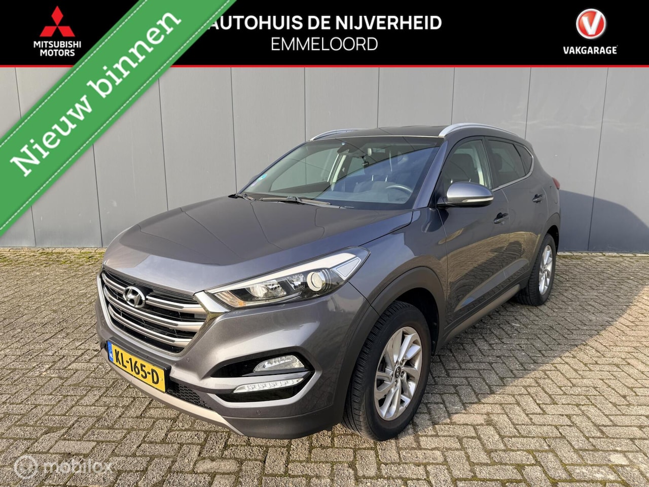 Hyundai Tucson - 1.6 GDi Go! |trekhaak |navi |cruise control - AutoWereld.nl