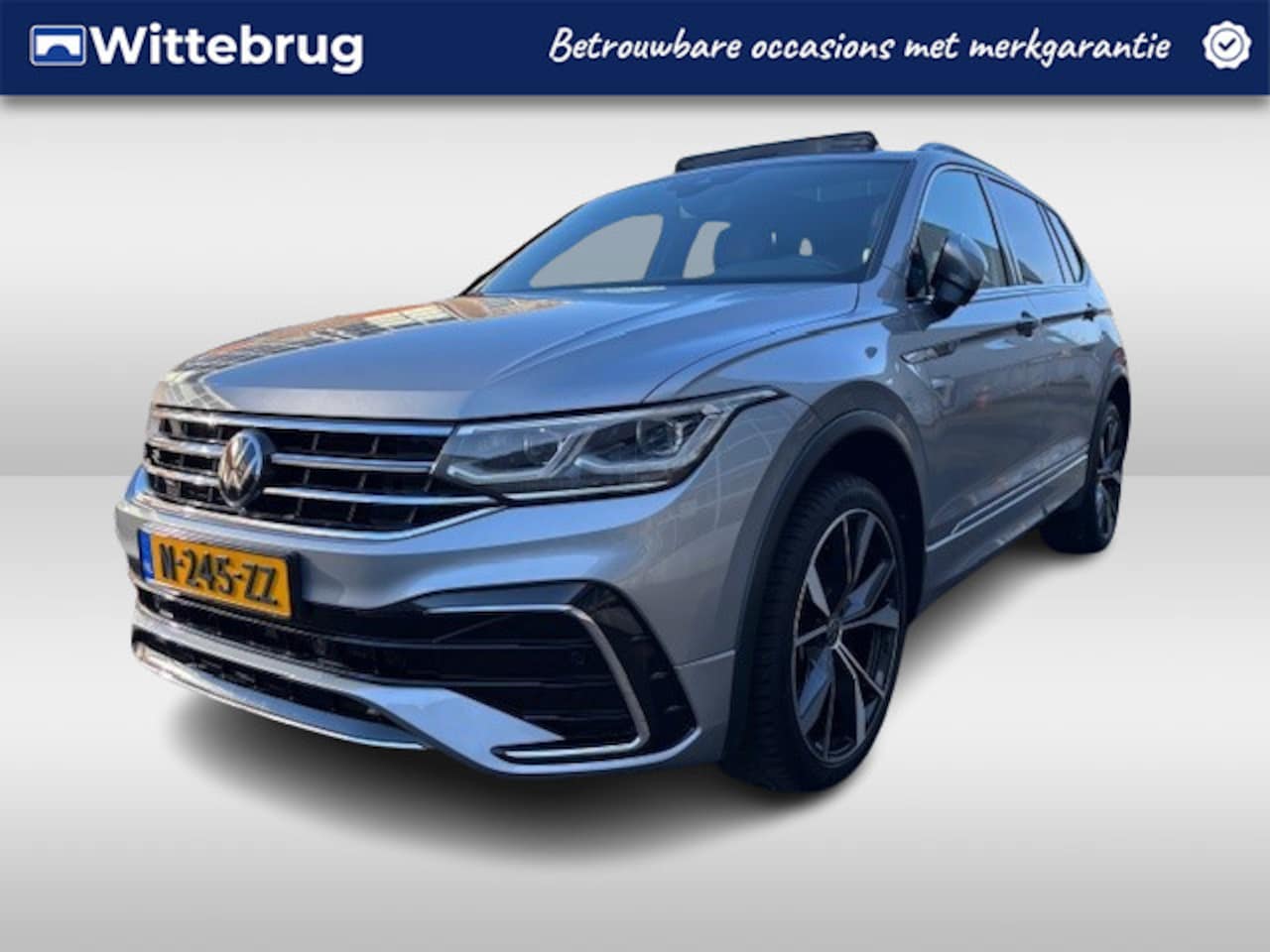 Volkswagen Tiguan Allspace - 1.5 TSI R-Line Business+ 7 persoons DSG Automaat Winterpakket / El. achterklep / Panoramad - AutoWereld.nl