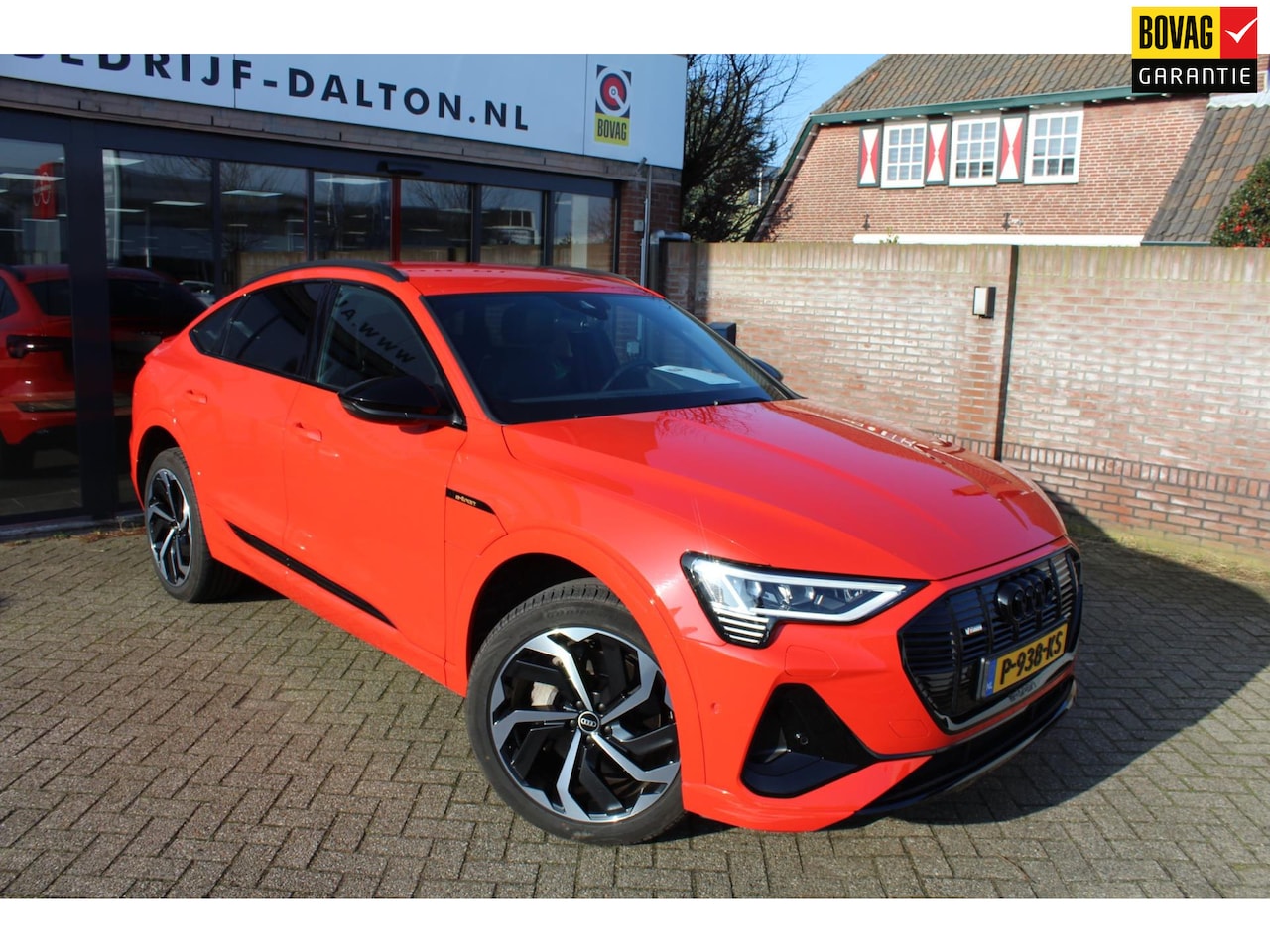 Audi e-tron Sportback - 55 quattro S edition 95 kWh ORANGE MET - AutoWereld.nl