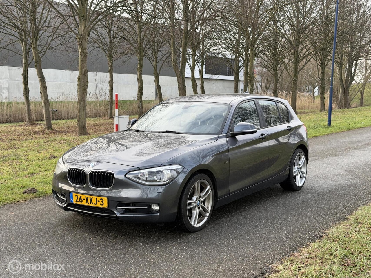 BMW 1-serie - 118i Business*NEW APK 03/27*6 BAK*NAVIGATIE*NAP - AutoWereld.nl