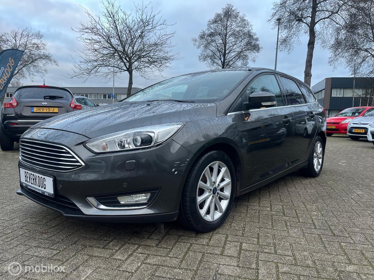 Ford Focus Wagon - 1.0 TITANIUM 92 KW 6/12 M GARANTIE - AutoWereld.nl