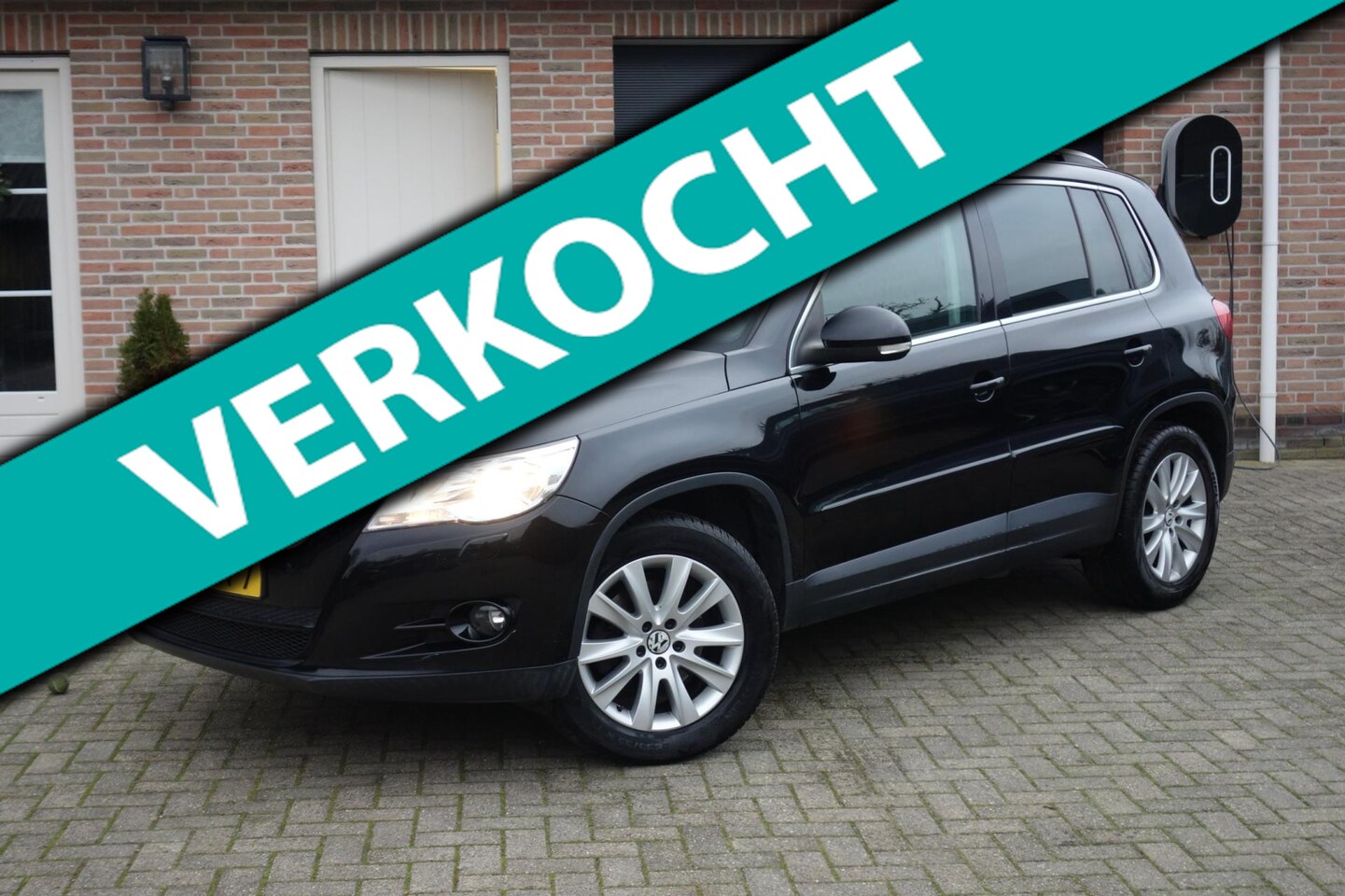Volkswagen Tiguan - 1.4 TSI Trend&Fun 4X4 leer - AutoWereld.nl