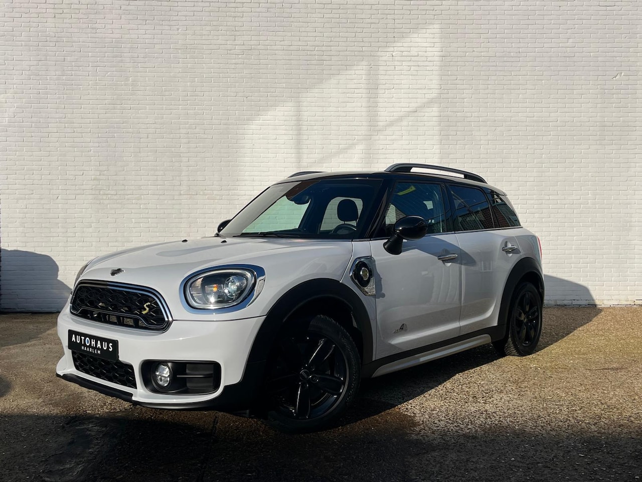MINI Countryman - 1.5 Cooper SE ALL4 Chili - AutoWereld.nl