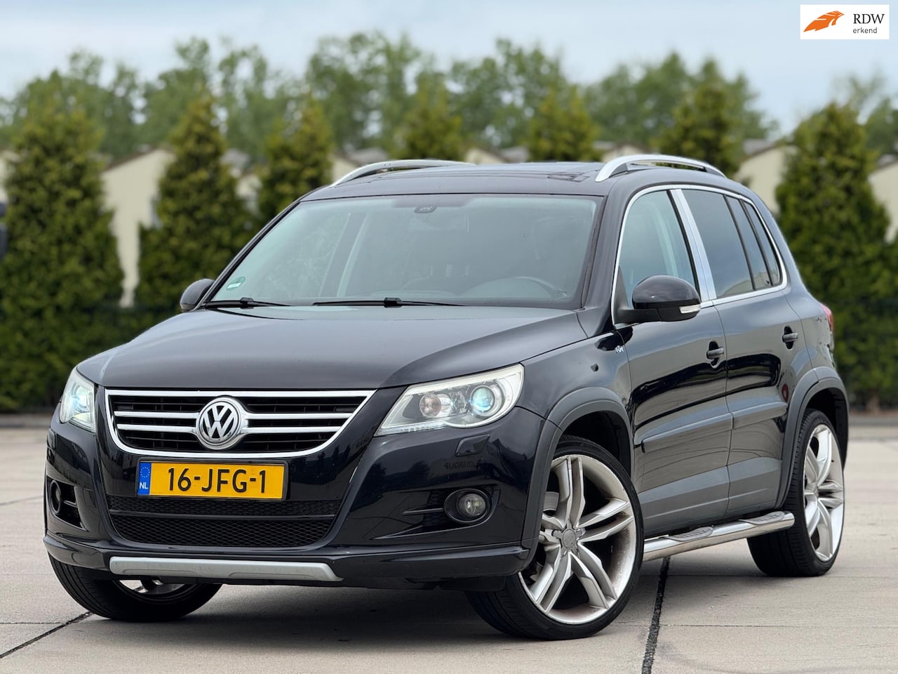 Volkswagen Tiguan - 1.4 TSI Sport&Style 4Motion | Panoramadak | Elektrische sportstoelen met leder | Achteruit - AutoWereld.nl
