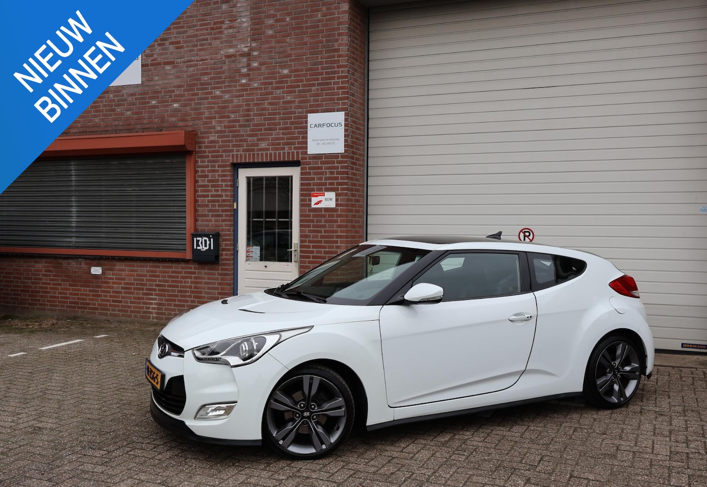 Hyundai Veloster - 1.6 GDI i-Catcher Open dak Keyless Leder NAP Camera Cruise PDC Navi Airco APK - AutoWereld.nl