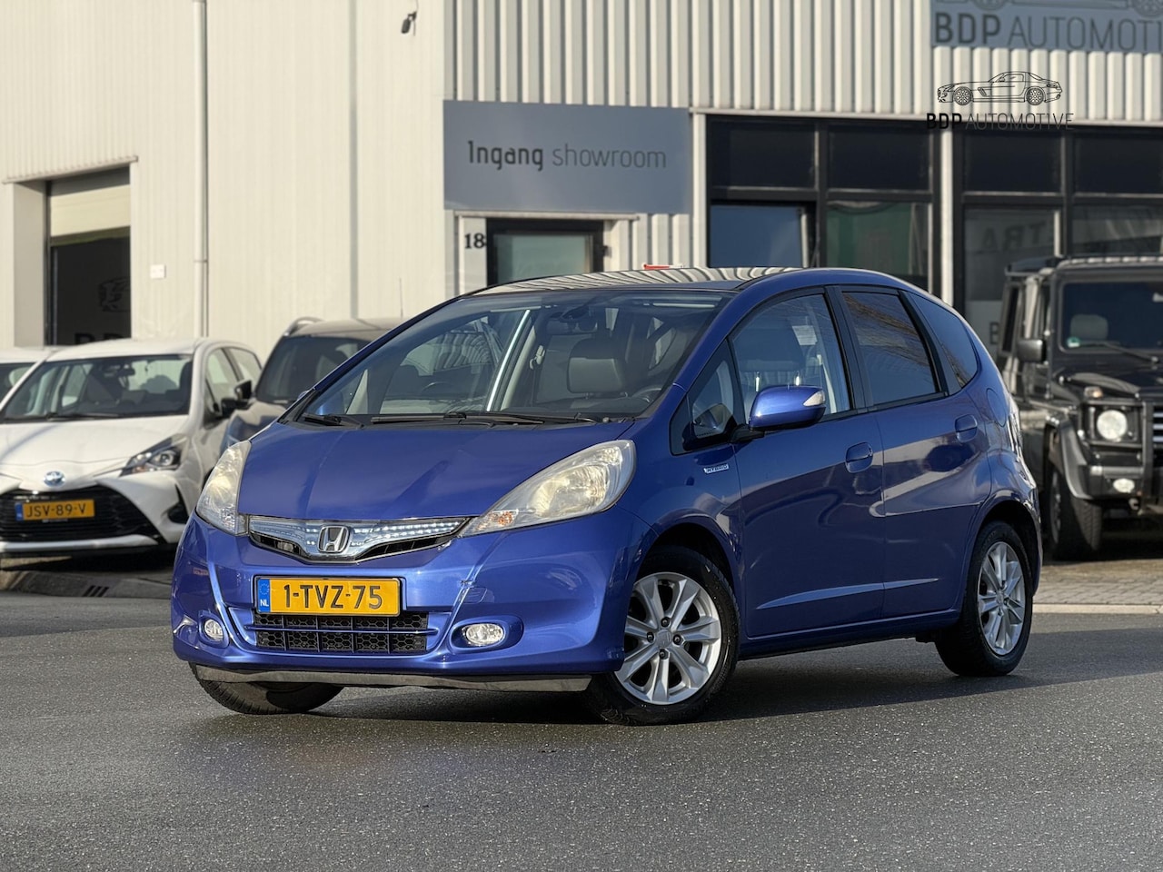 Honda Jazz - 1.4 Hybrid Exclusive Lage km✅ LEER | PANORAMADAK | Stoelverwarming | Automaat - AutoWereld.nl