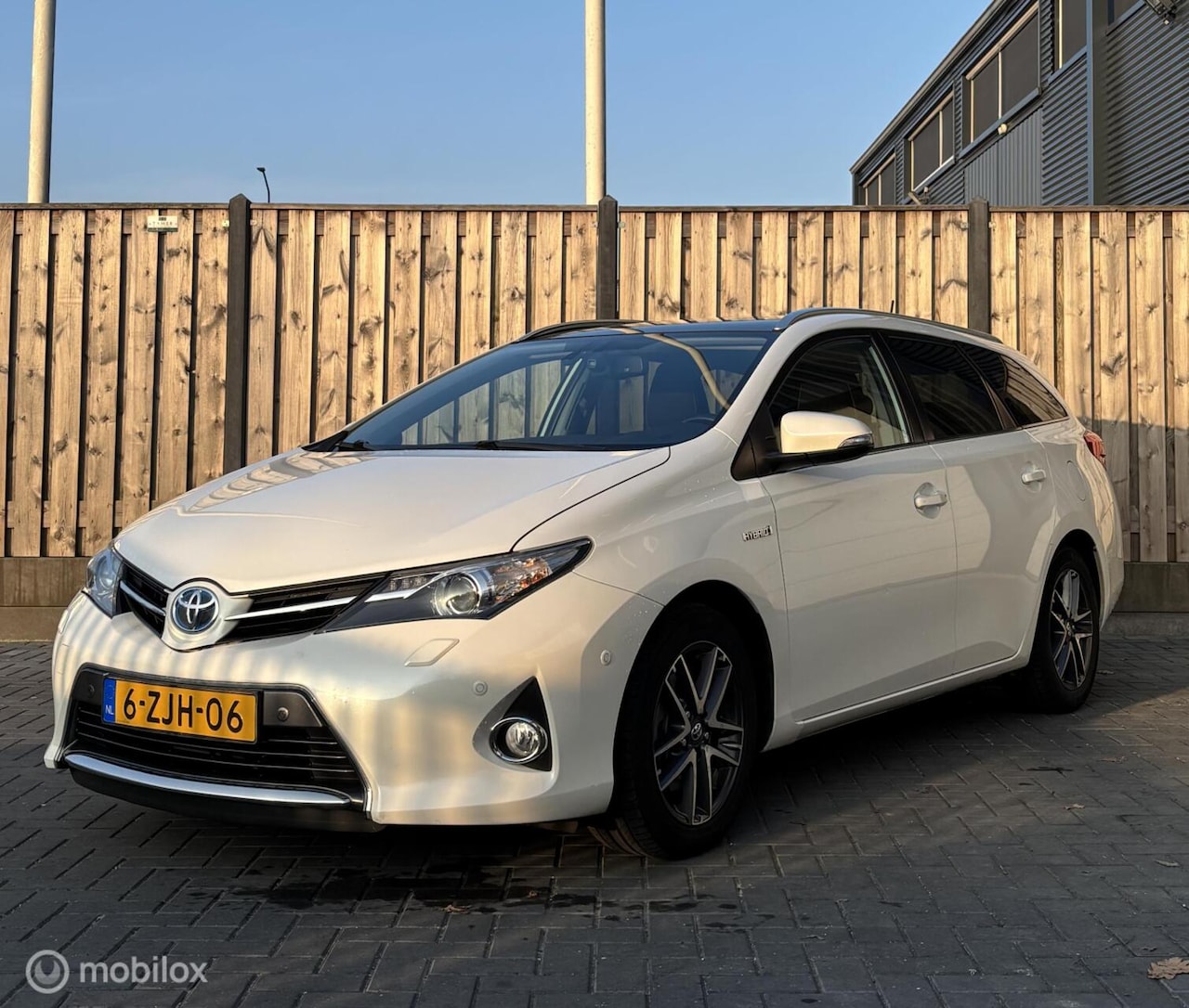 Toyota Auris - 1.8 Hybrid Lease/Navi/Camera/Bluetooth/Cruise/ - AutoWereld.nl
