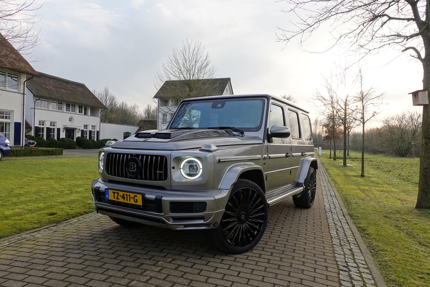 Mercedes-Benz G-klasse - 500 | BRABUS | AKRAPOVIČ | Burmester | 360° Camera | Massage | Schuif/kantel | 24"INCH | - AutoWereld.nl