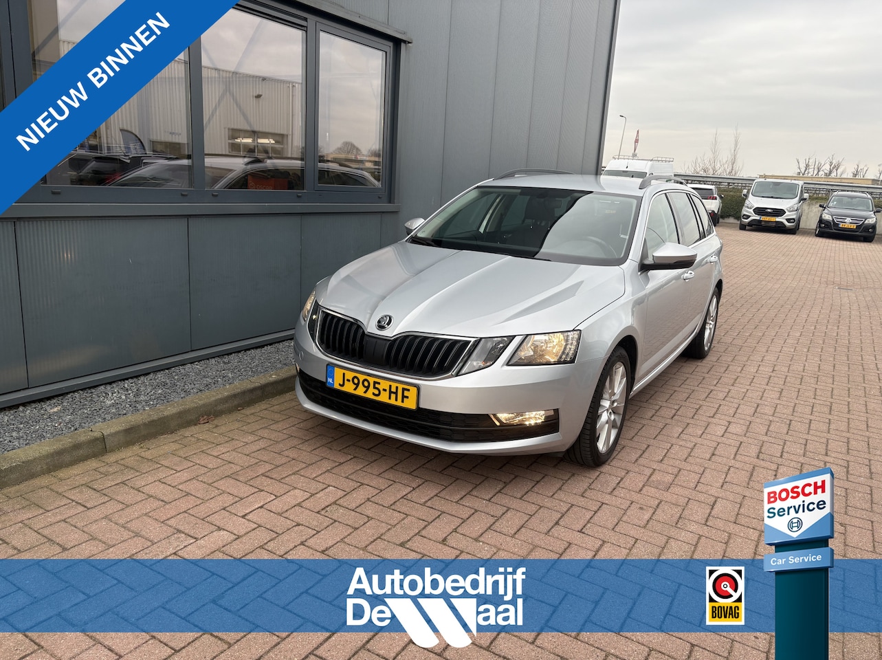 Skoda Octavia Combi - 1.0 TSi 115pk Business Edition LEDER/NAVI/CARPLAY/CRUISE/PDC/WINTERPACK - AutoWereld.nl