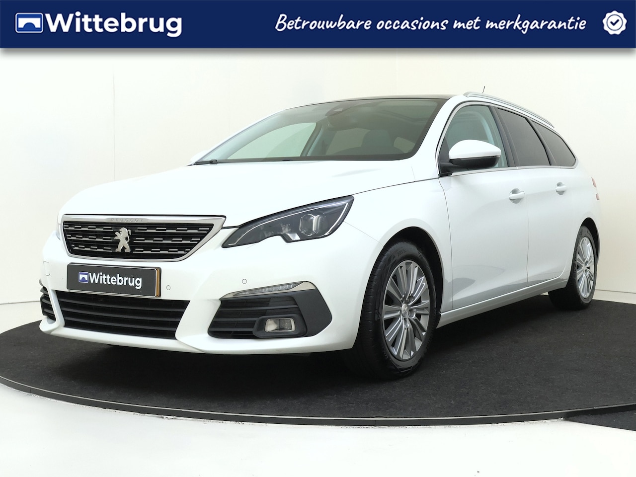 Peugeot 308 SW - 1.2 PureTech Blue Lease Premium | Panodak | Camera | Climate Control | Carplay | - AutoWereld.nl
