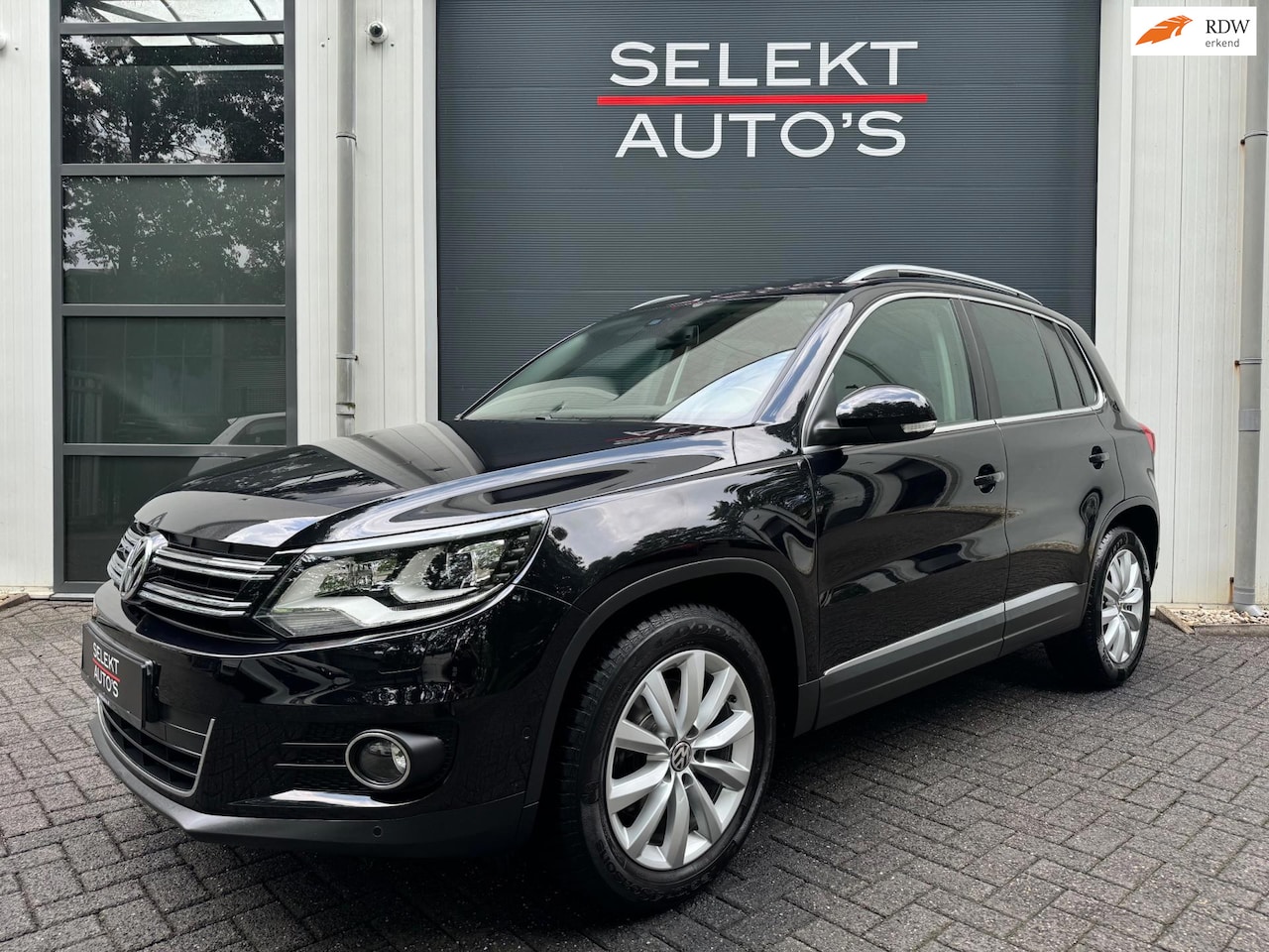 Volkswagen Tiguan - 1.4 TSI Sport & Style 122 Pk Pano/Xenon/Led/Navi/Cruise/Airco/Stoelverwarming/Alcantara/Pa - AutoWereld.nl