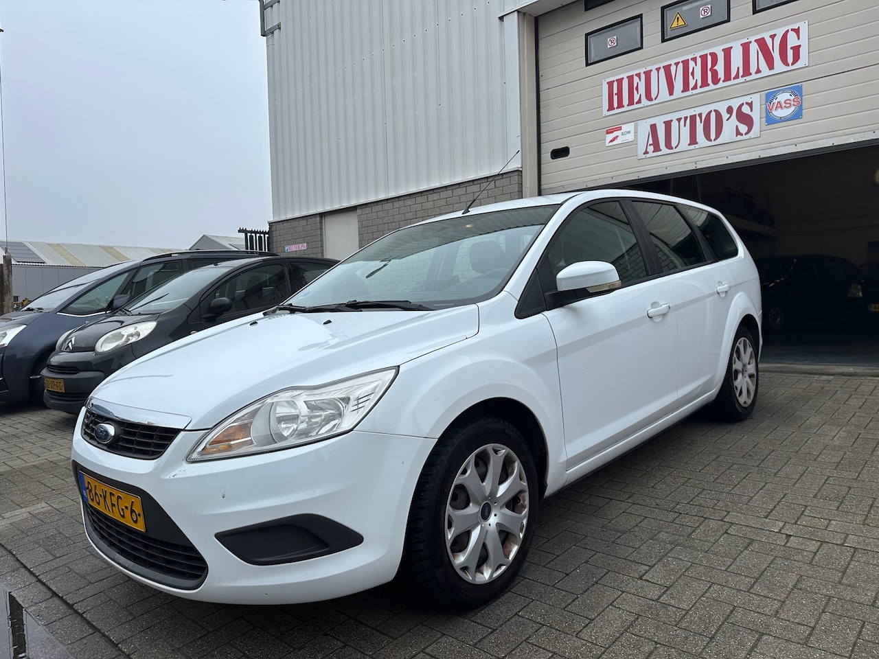 Ford Focus Wagon - 1.8 Trend Flexi Fuel | Airco | Trekhaak | Cruise | APK - AutoWereld.nl