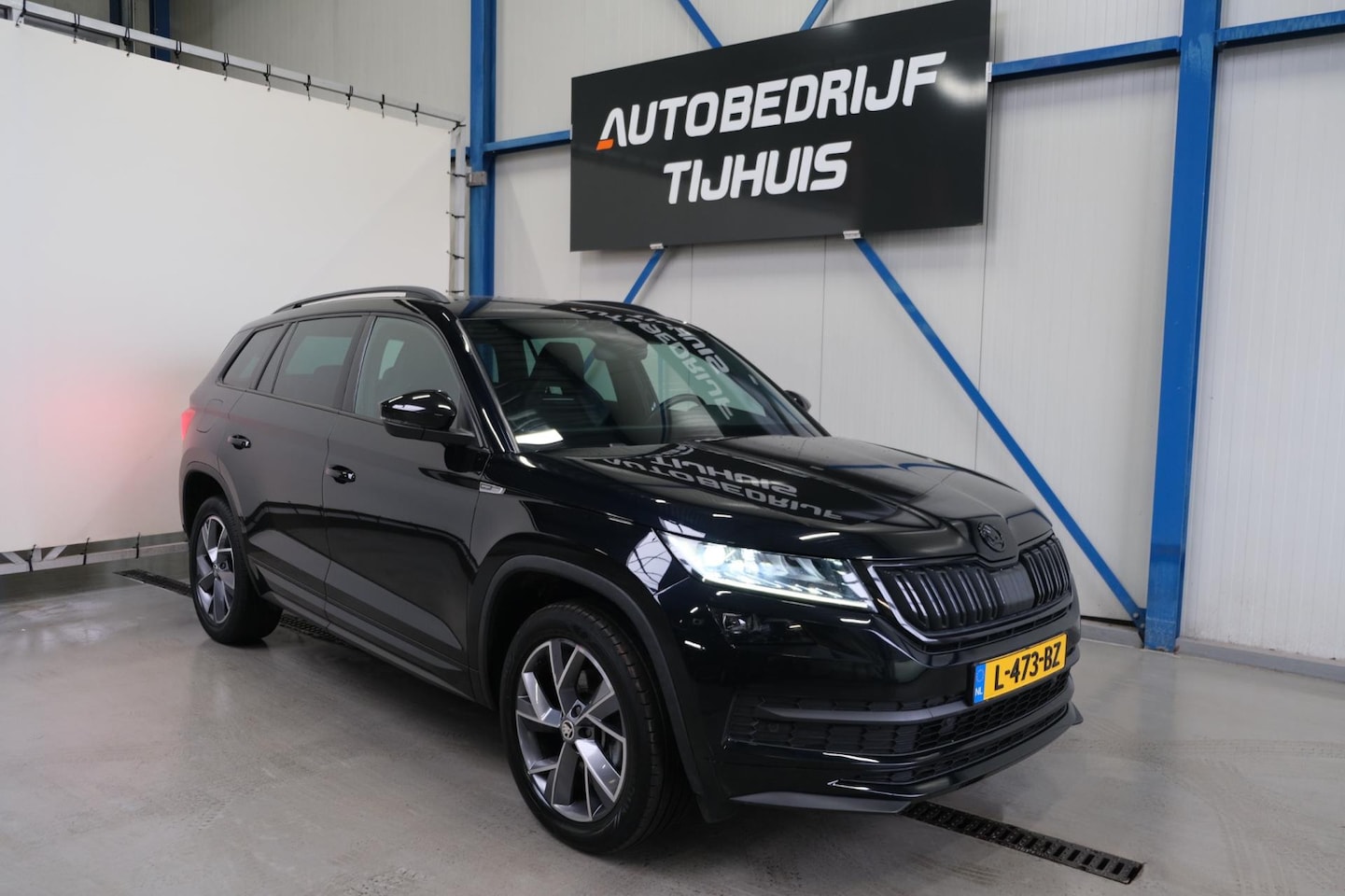 Skoda Kodiaq - 1.5 TSI Sportline Business 7p. Automaat - N.A.P. Airco, Cruise, Navi, PDC. - AutoWereld.nl