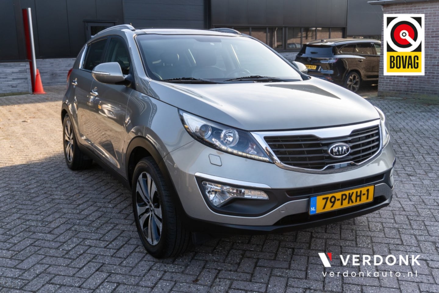 Kia Sportage - 2.0 X-clusive | panoramadak | stoelverwarming | leder | camera - AutoWereld.nl