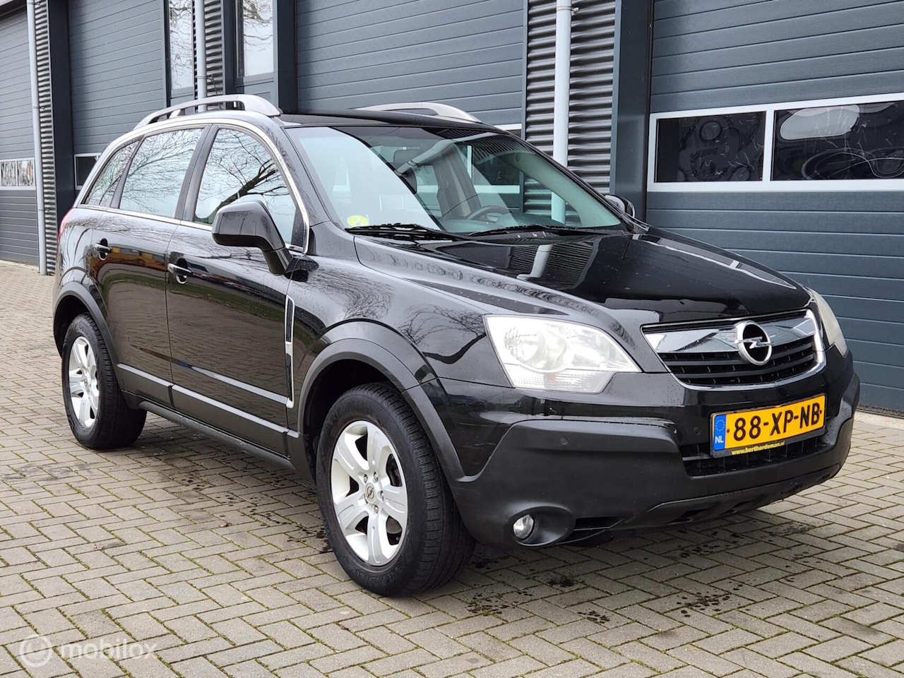 Opel Antara - 2.4-16V Enjoy 4x4 | AIRCO | CRUISE | NAP | TREKHAAK - AutoWereld.nl