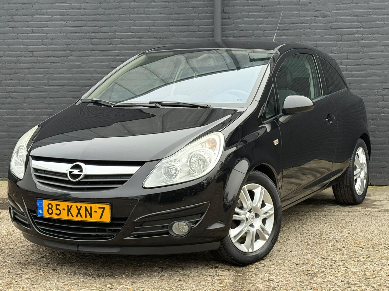 Opel Corsa - 1.2-16V Cosmo AIRCO | CRUISE | PDC | NWE APK - AutoWereld.nl