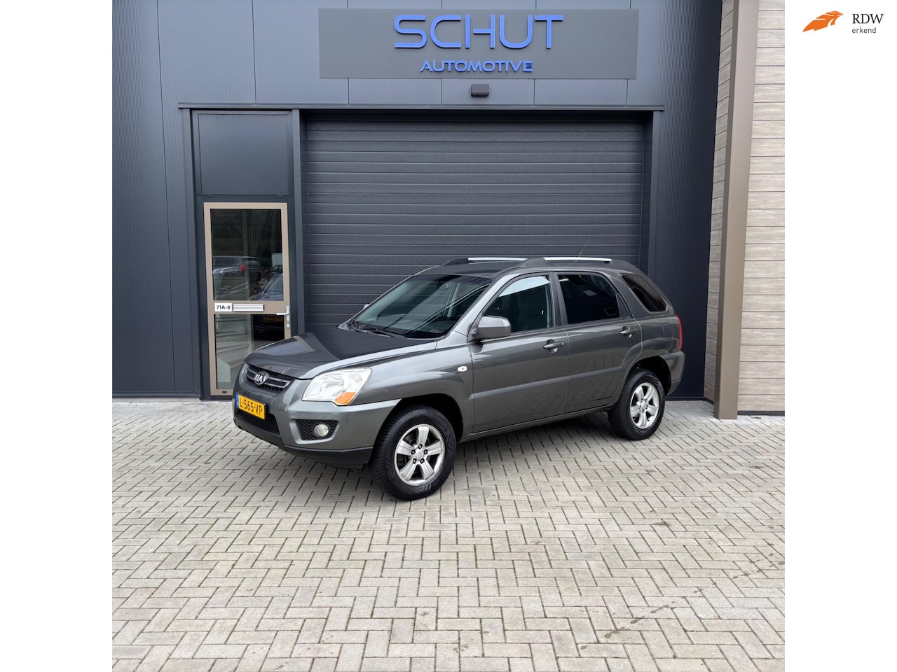 Kia Sportage - 2.0 X-clusive AIRCO | LEDER | CRUISE CONTROL | APK 11-2026 | LAGE KM-STAND - AutoWereld.nl