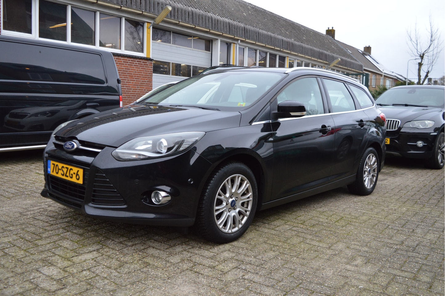 Ford Focus Wagon - 1.6 EcoBoost Lease Titanium NL-auto / Clima - AutoWereld.nl