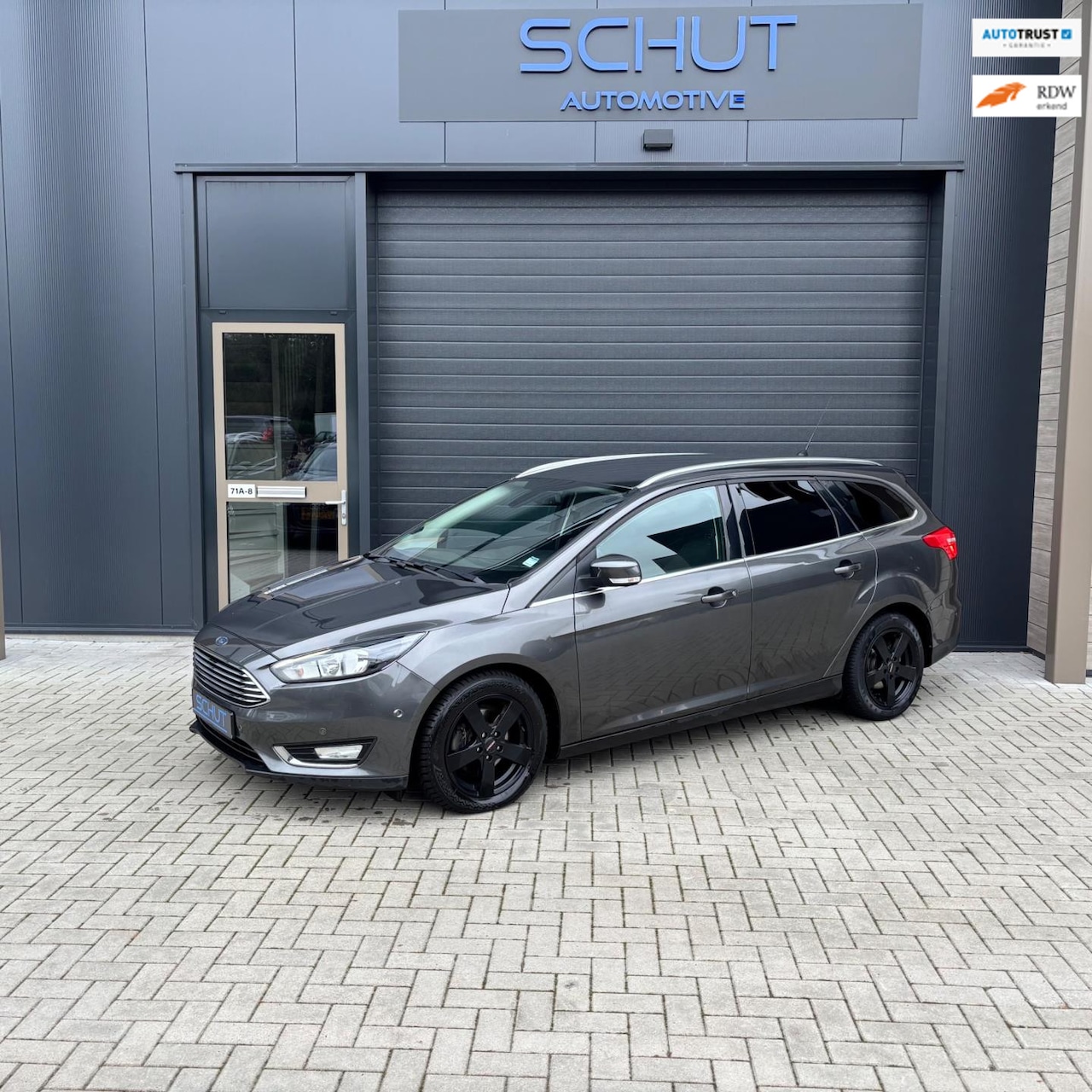 Ford Focus Wagon - 125pk Titanium Edition CLIMA | NAVI | STOELVERWARMING | PARKASSIST | SYNC | CRUISEN CONTRO - AutoWereld.nl