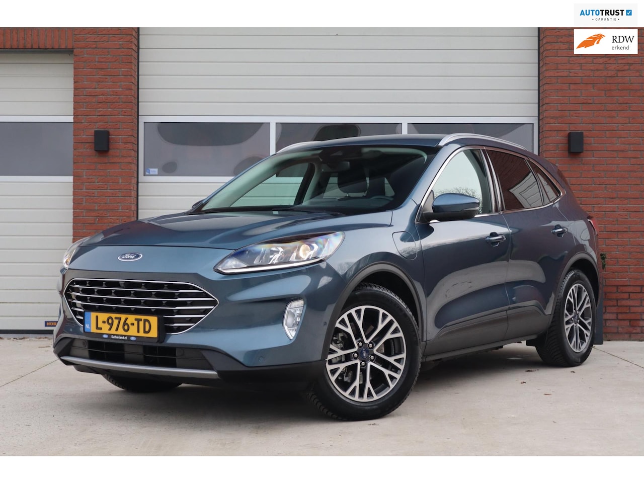 Ford Kuga - 2.5 PHEV Titanium - Trekhaak wegklapbaar - Winterpack - Cruise control - DAB - Camera - LE - AutoWereld.nl