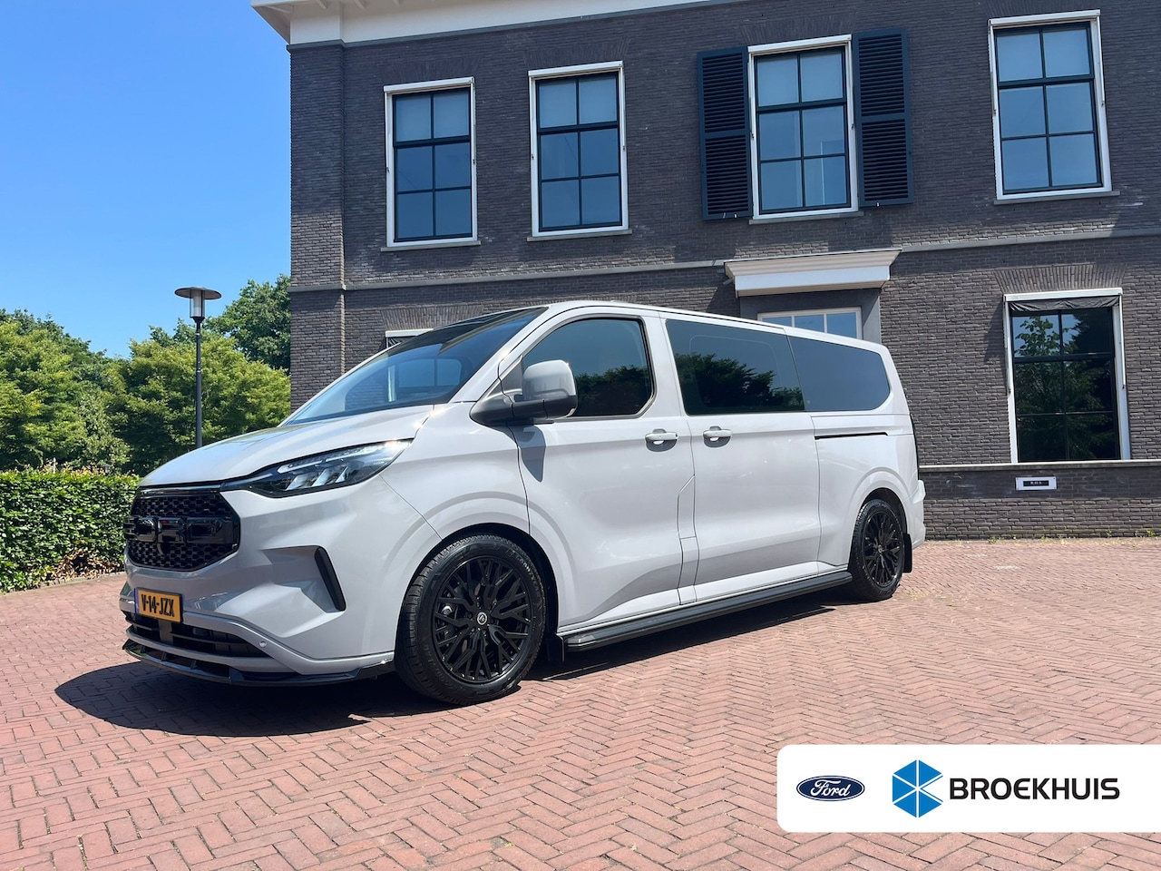 Ford Transit Custom - 320 2.0 TDCI L2H1 Black Edition dubbele cabine Leder | 19"  | Glaslook | Spoiler | Full op - AutoWereld.nl